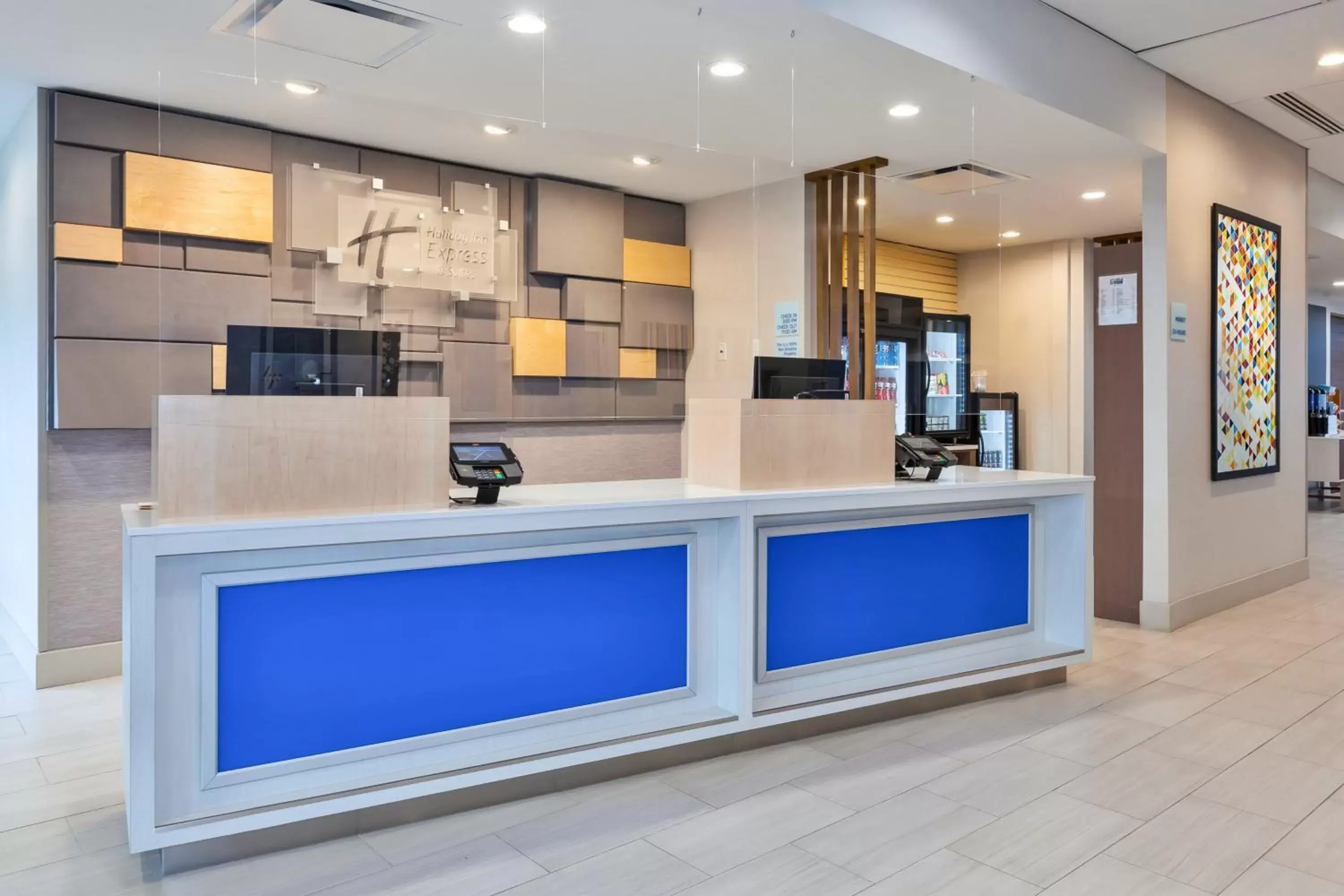 Property building, Lobby/Reception in Holiday Inn Express & Suites - Grand Rapids Airport - South, an IHG Hotel