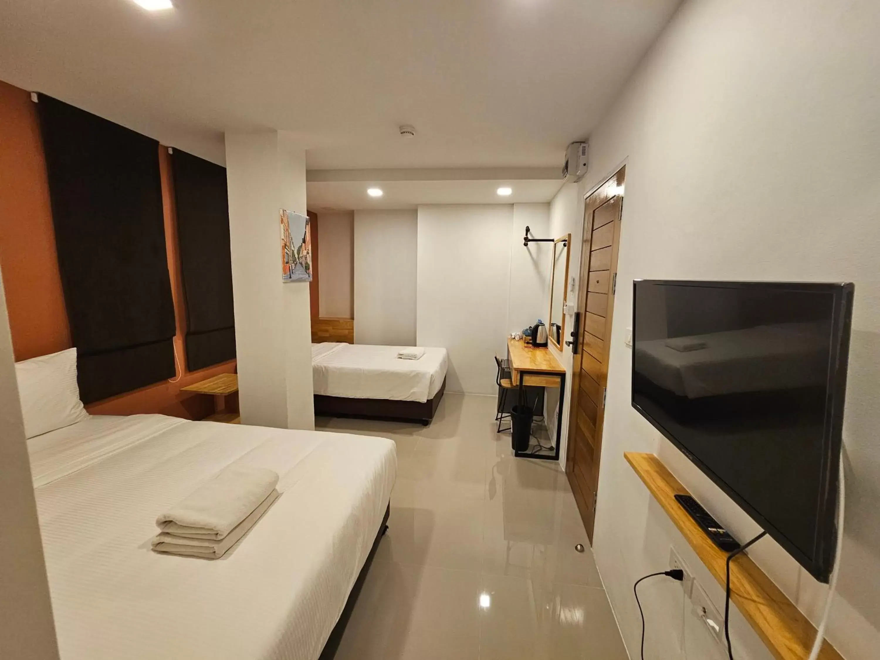 Bedroom, TV/Entertainment Center in Sleepstation at Pratunam