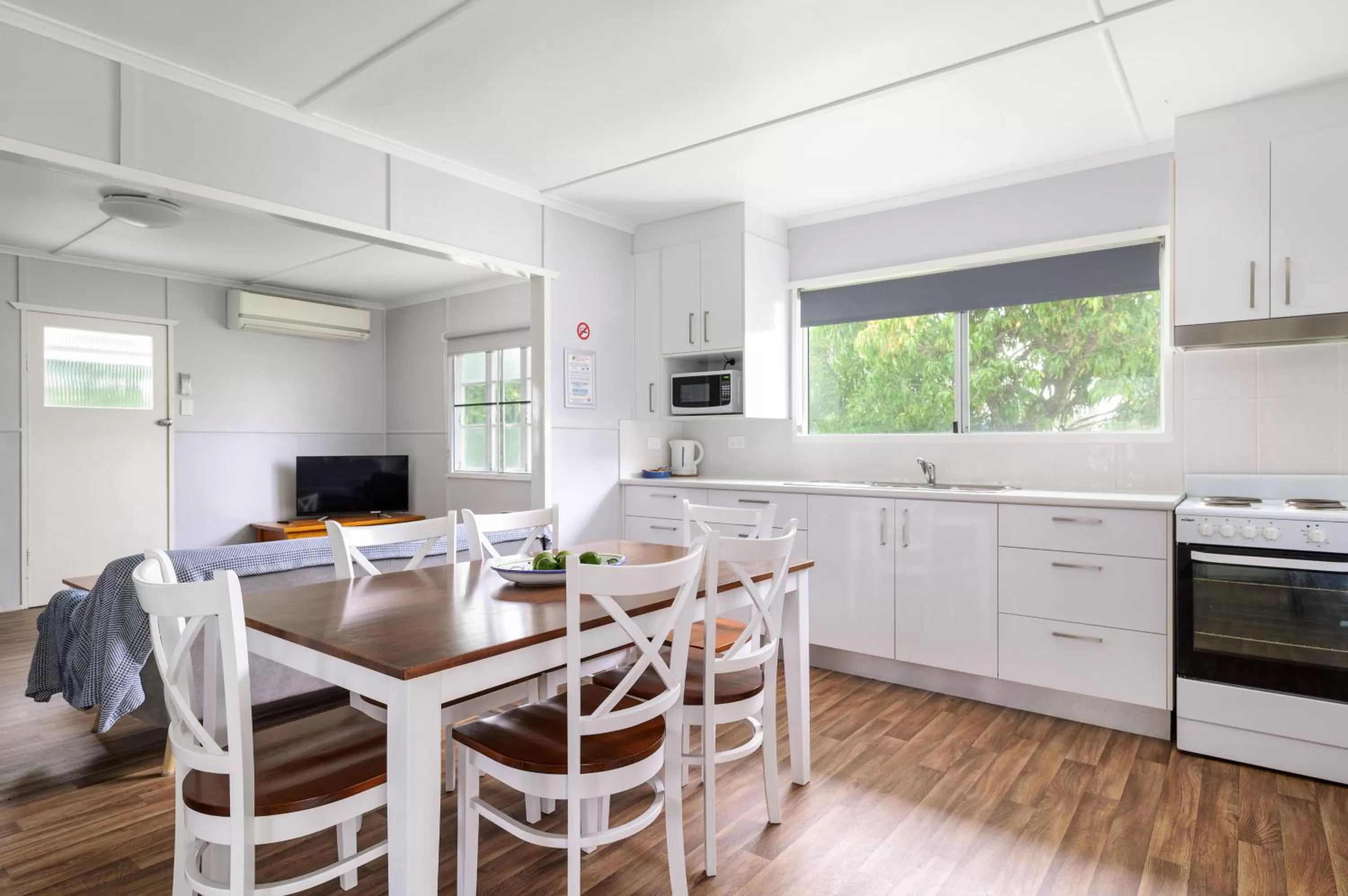 Kitchen or kitchenette in Tin Can Bay's Sleepy Lagoon Motel