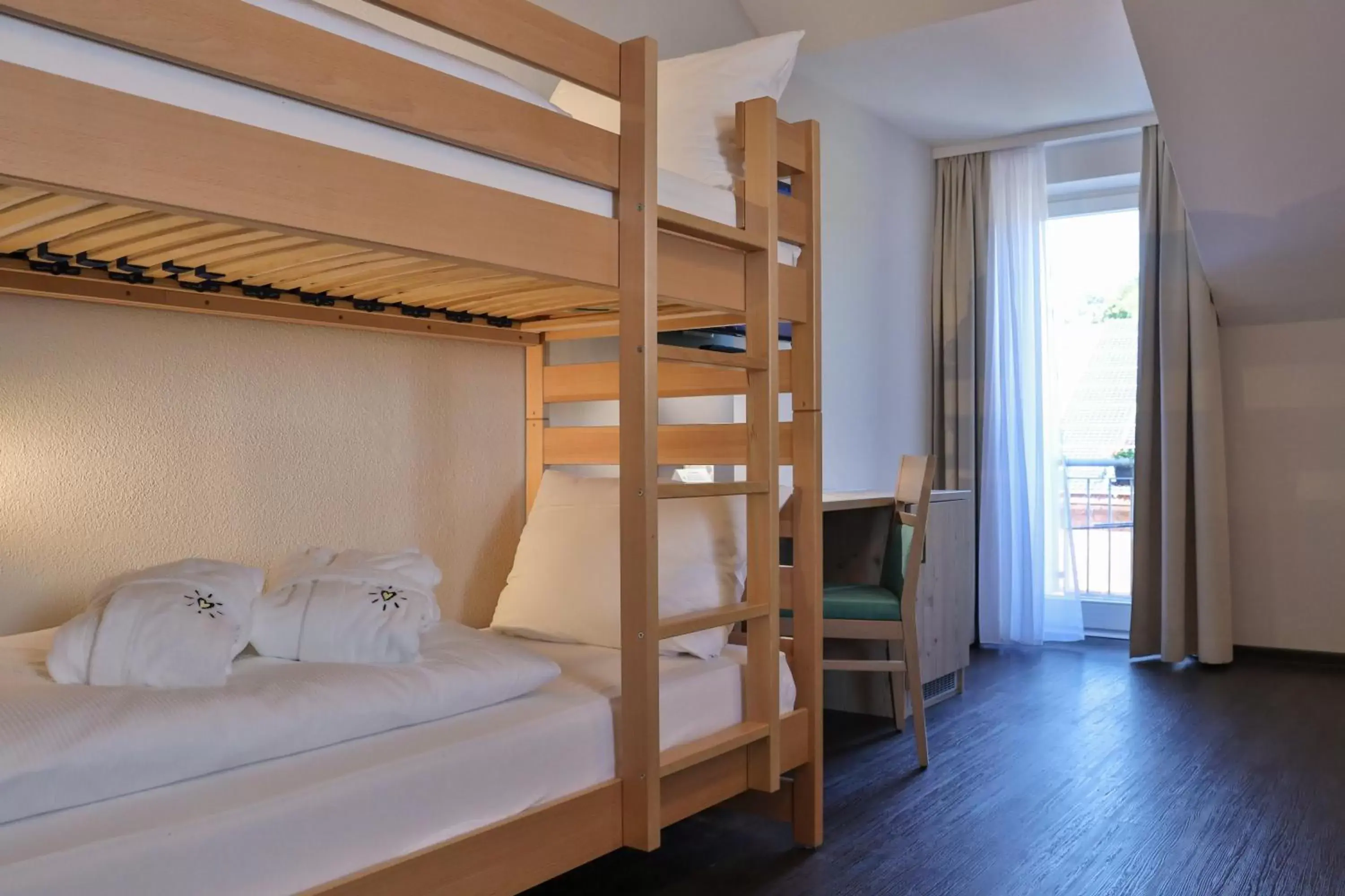 Bed, Bunk Bed in Sonnenhotel Bayerischer Hof inklusive freier Eintritt ins AquaFit Erlebnisbad