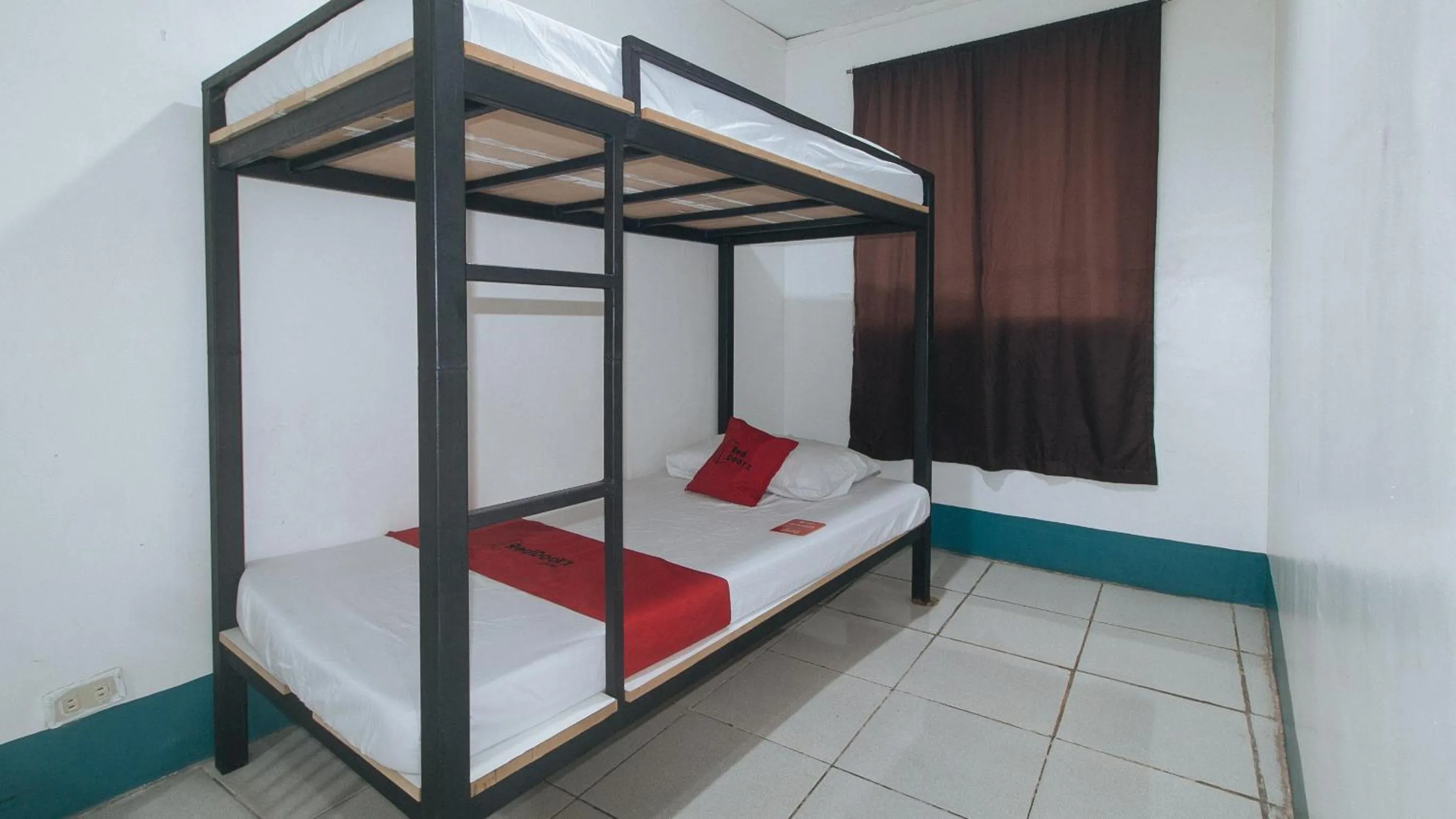 bunk bed, Bed in RedDoorz at Crowne One Condo