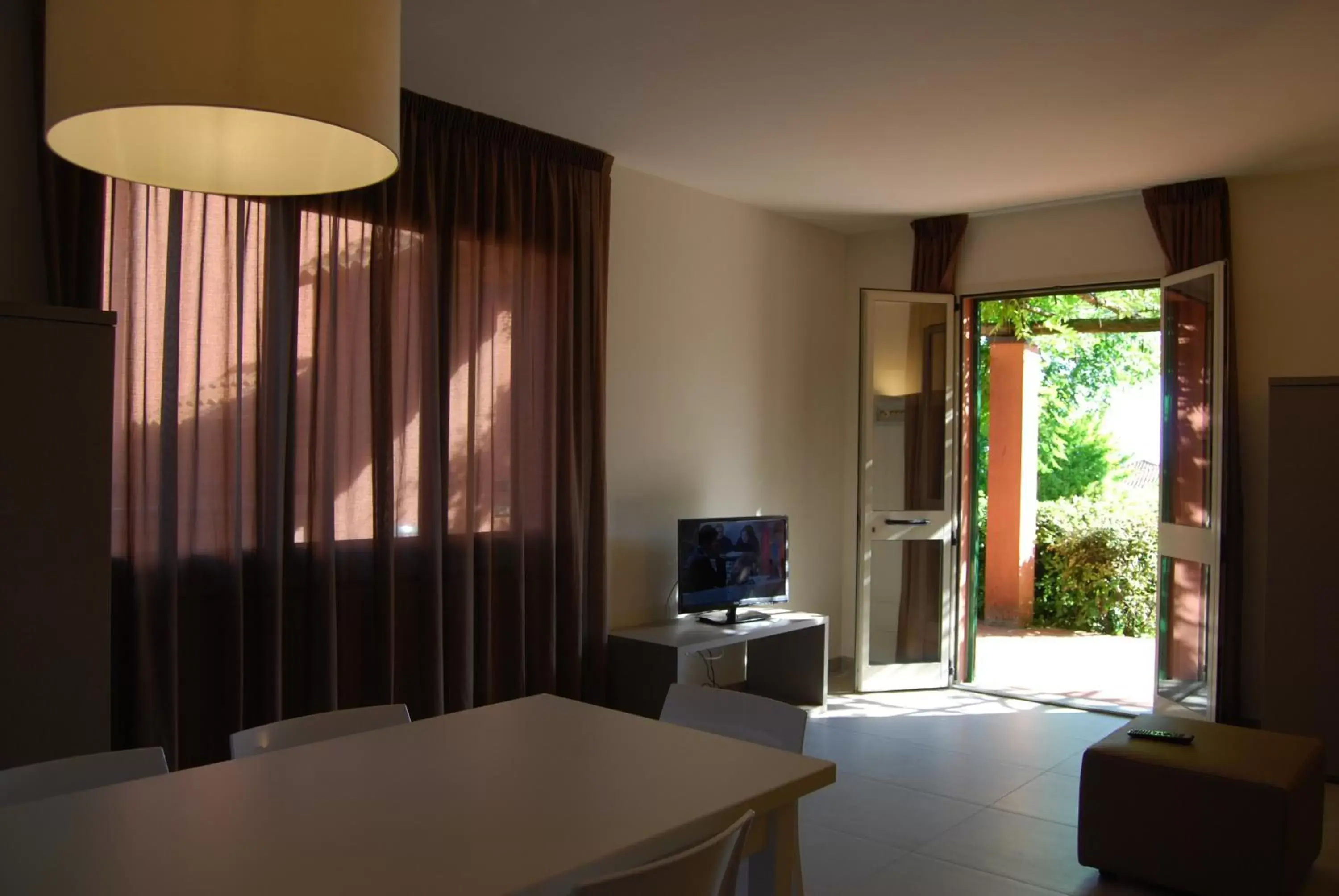 Dining area, TV/Entertainment Center in Residenze Al Colle Dei Pini