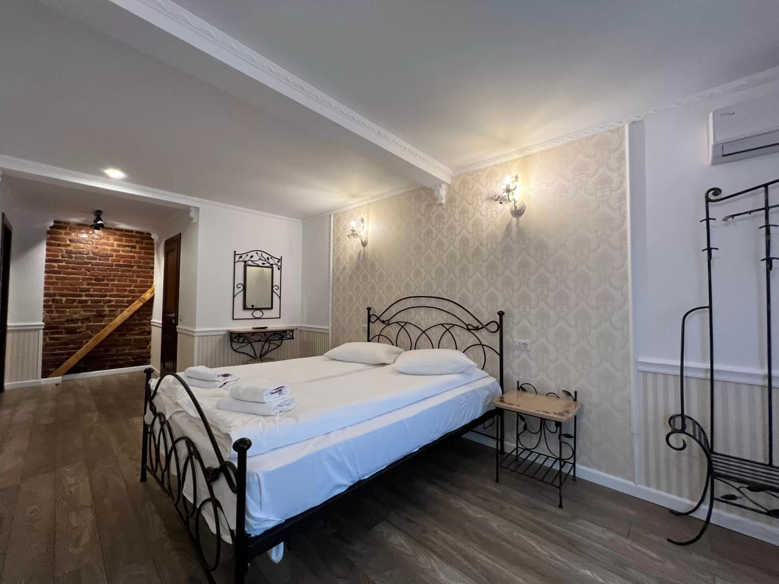 Bed in Hotel Boutique Cathedral Plaza Residences room for rent downtown