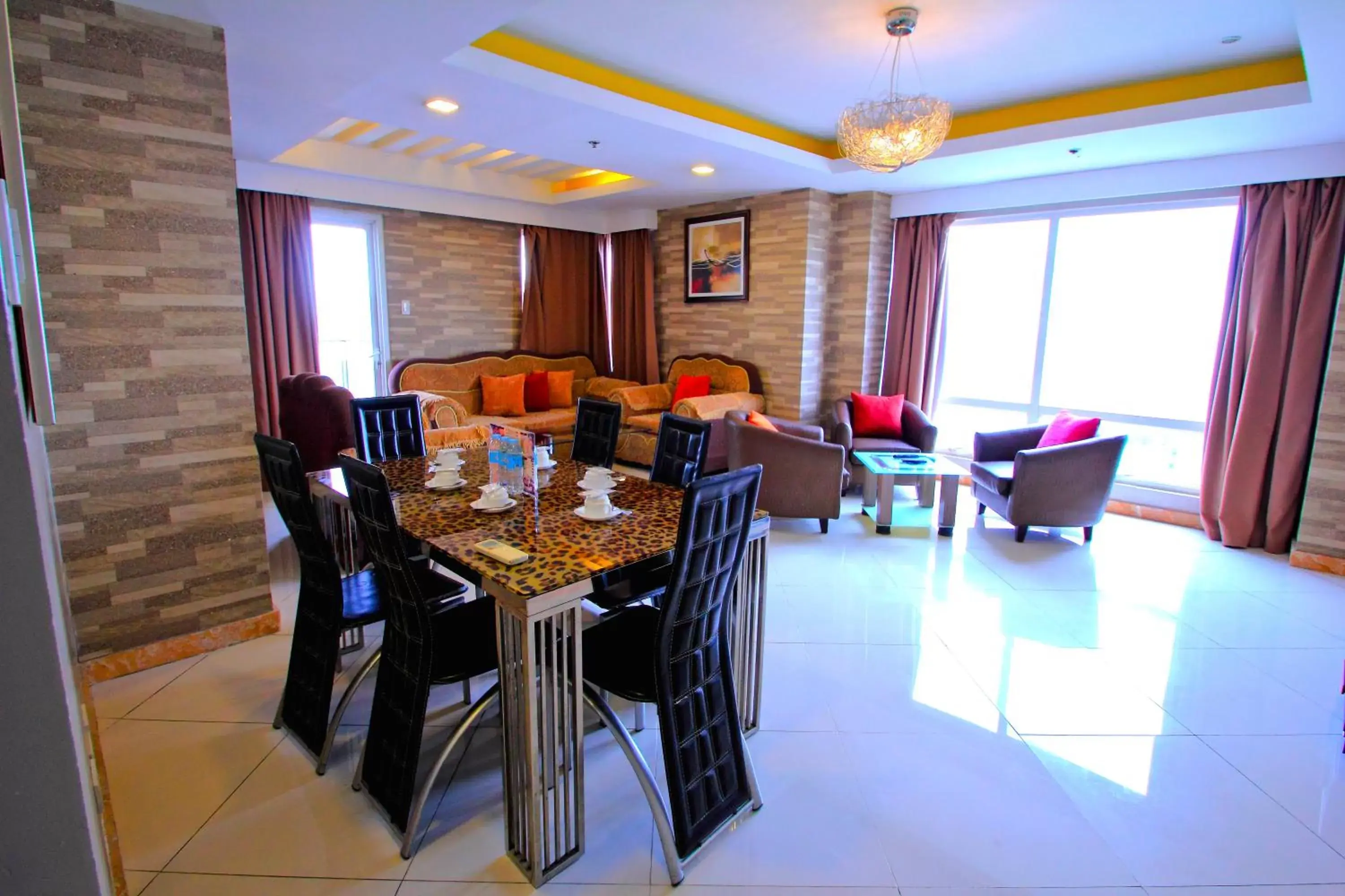 Living room, Restaurant/Places to Eat in JMM Grand Suites