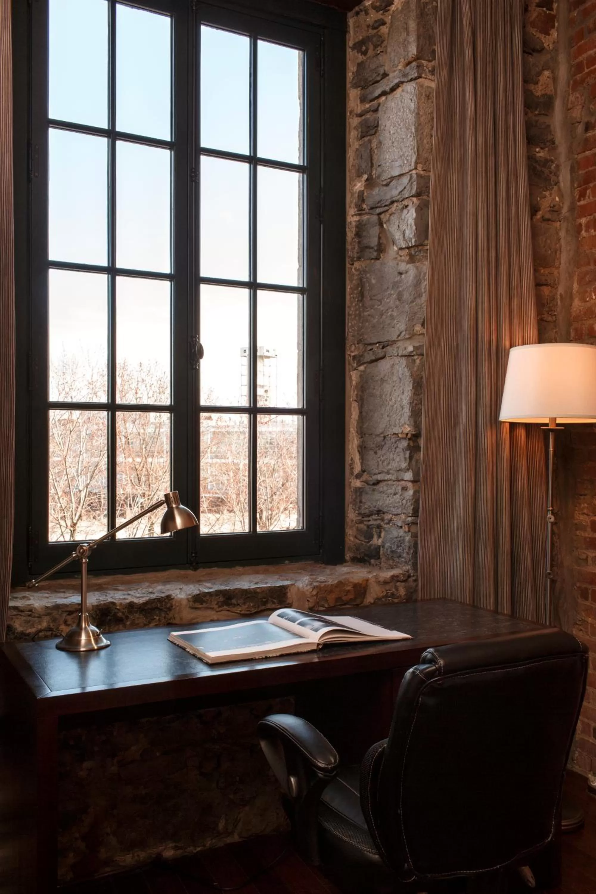 Seating area in Auberge du Vieux Port by Gray Collection