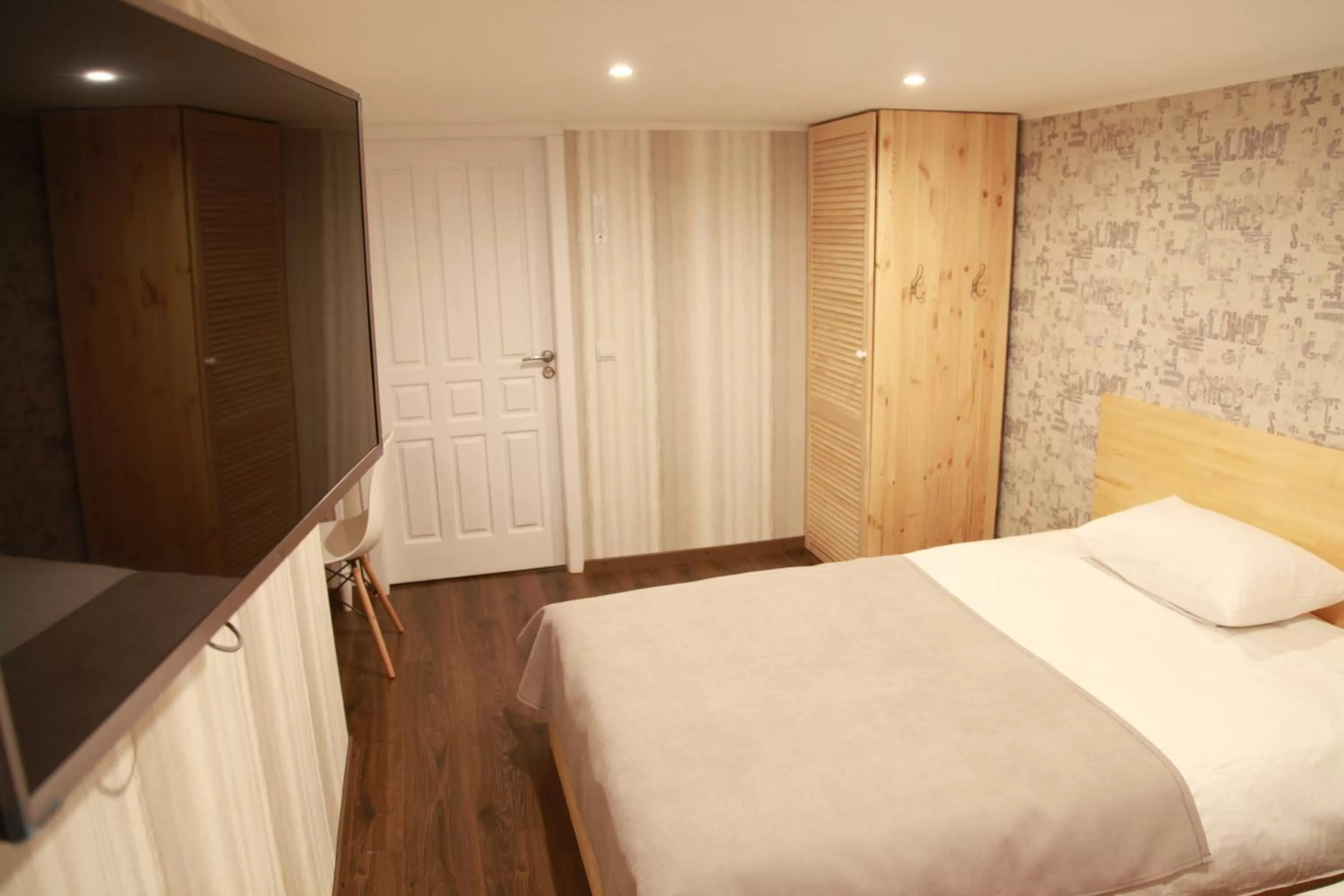 Bed in WINE & ROSE BOUTIQUE HOTEL