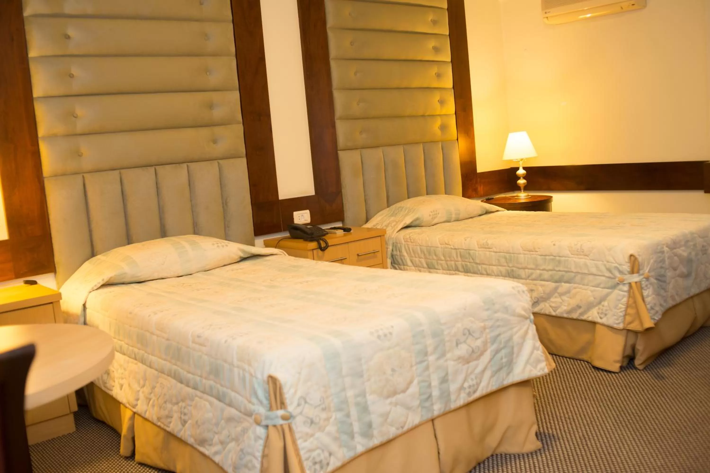 Bed in Rihad Palace Hotel