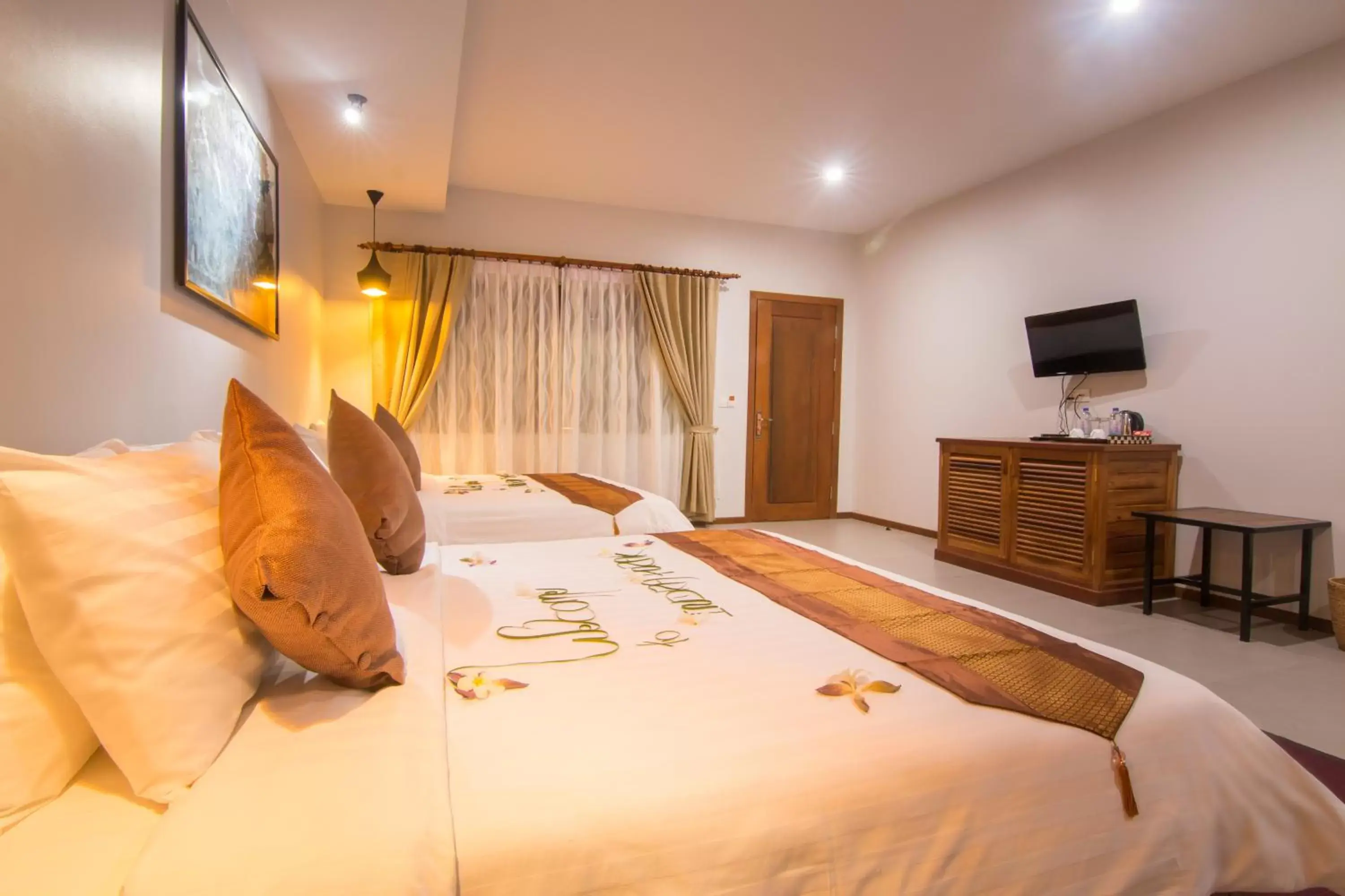 Bed in Indra Porak Residence Hotel