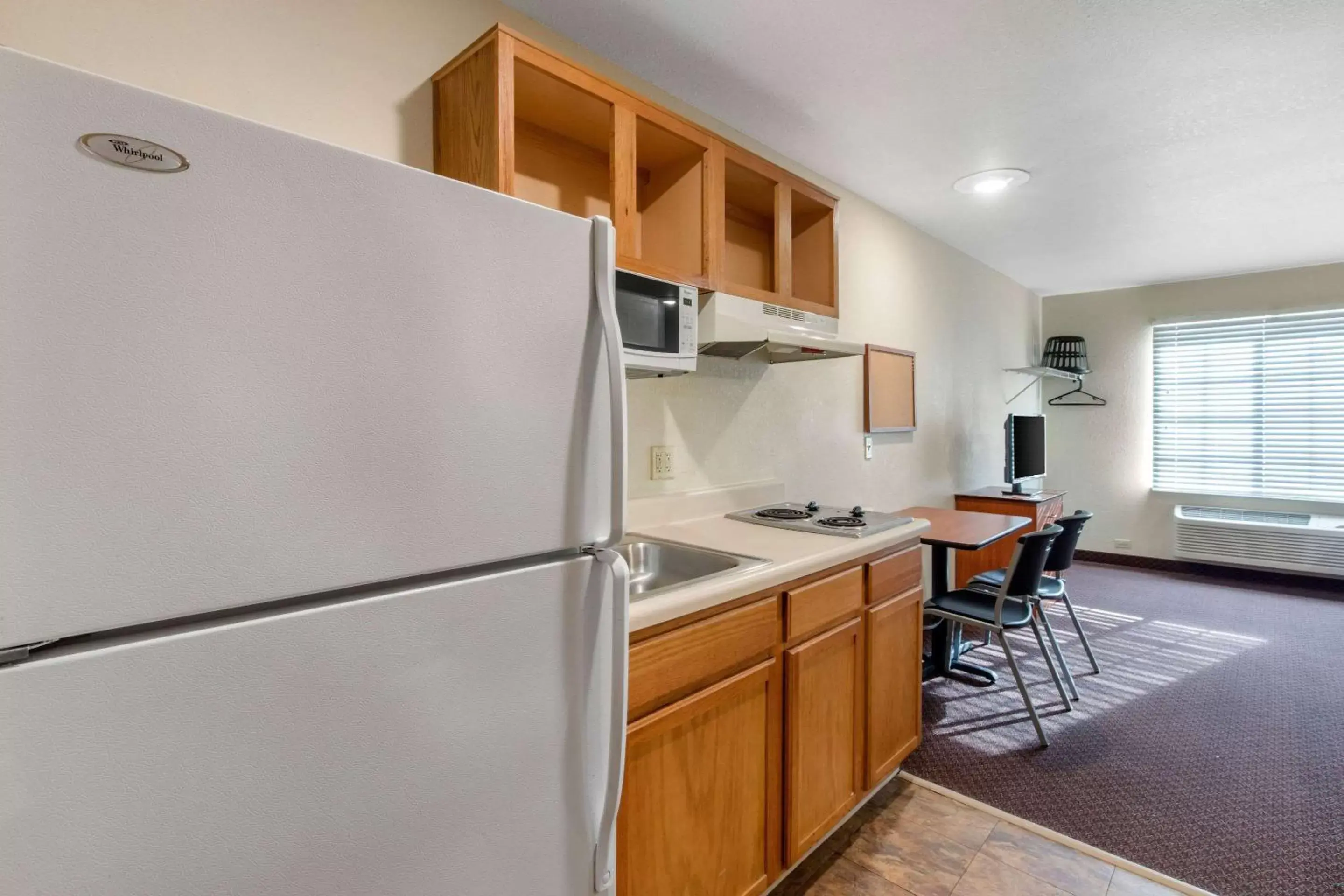 Kitchen or kitchenette, Kitchen/Kitchenette in Suburban Studios Huntsville University Area