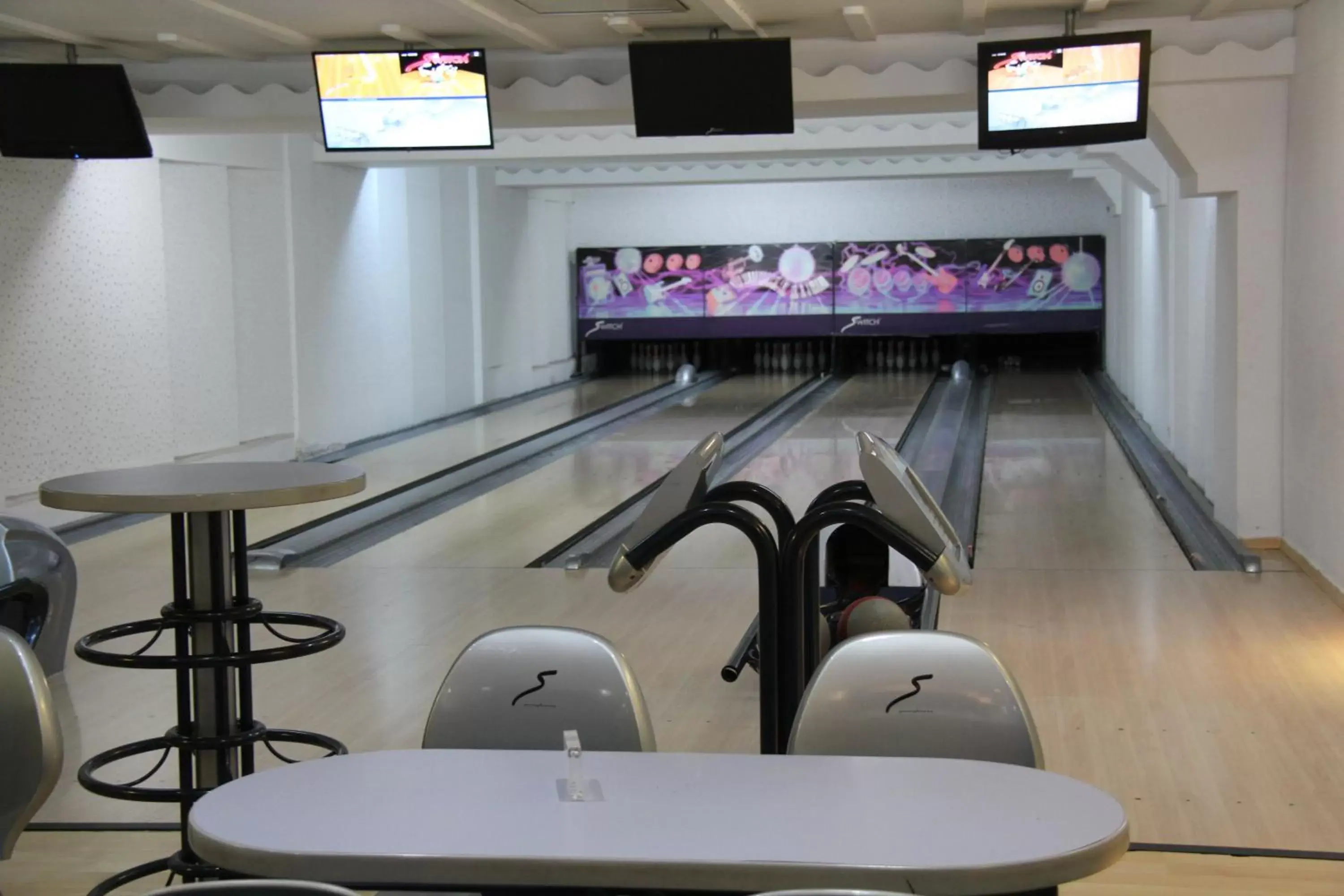 Bowling, TV/Entertainment Center in The Penthouse Suites Hotel