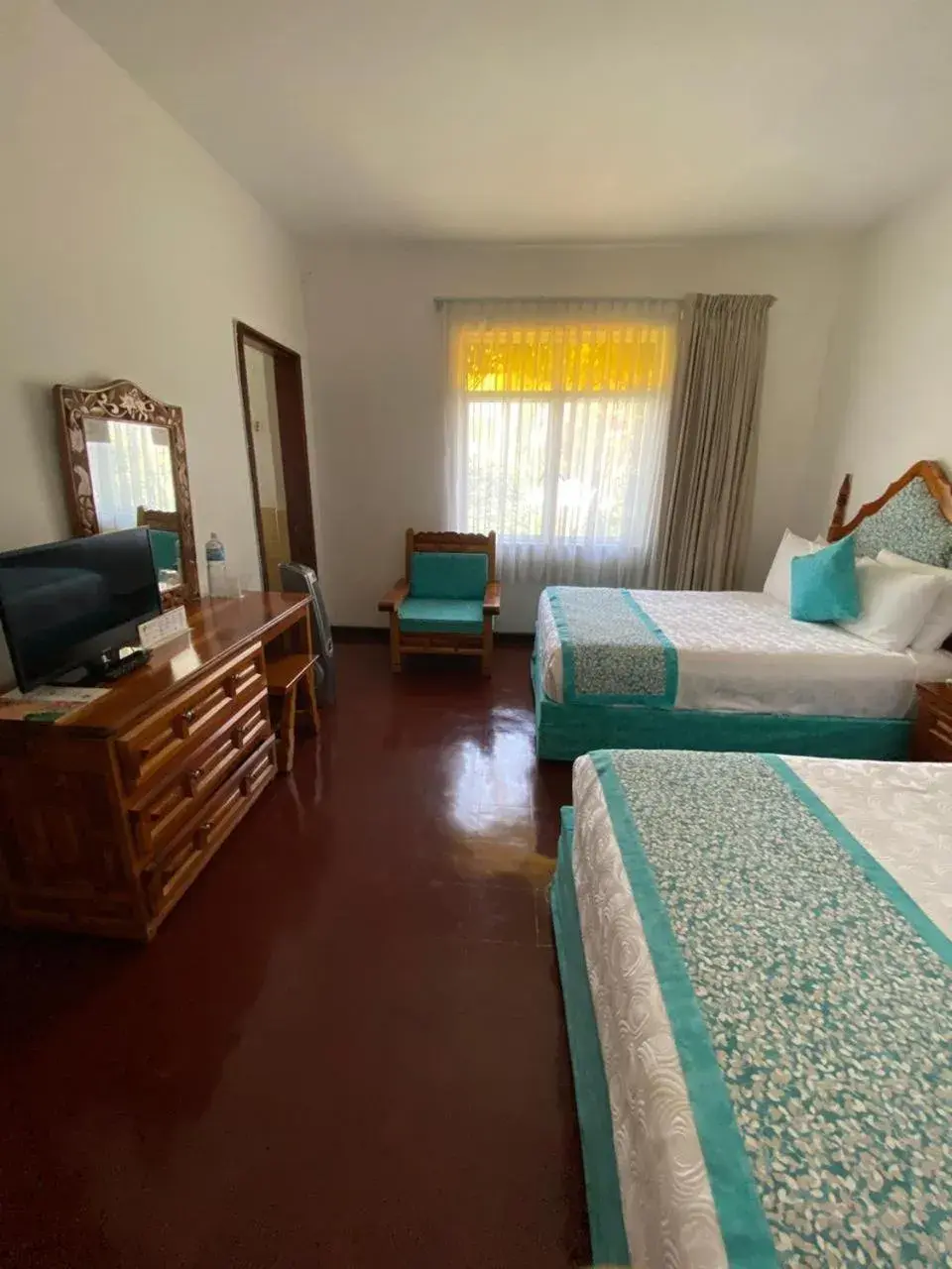 Bedroom in Hotel Posada Quinta Las Flores