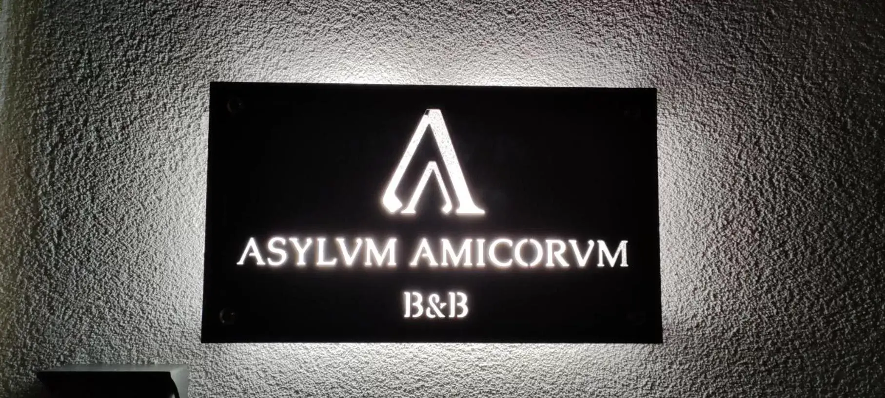 Property logo or sign in Asylum Amicorum Bed & Breakfast