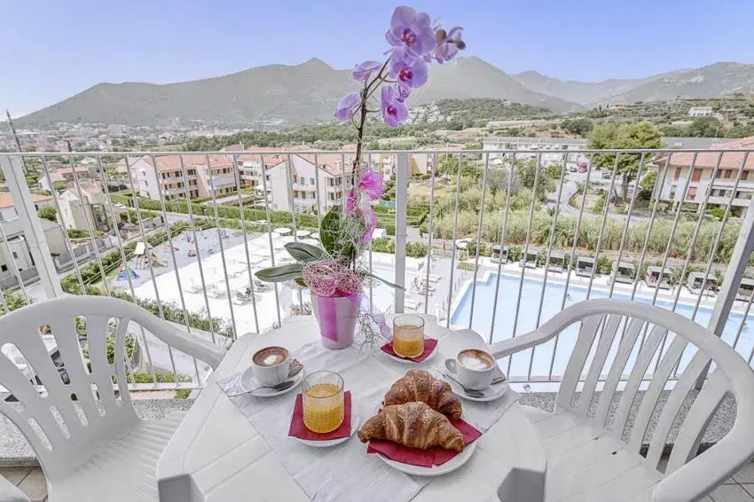 Breakfast, Mountain View in Ai Pozzi Village Hotel & Resort