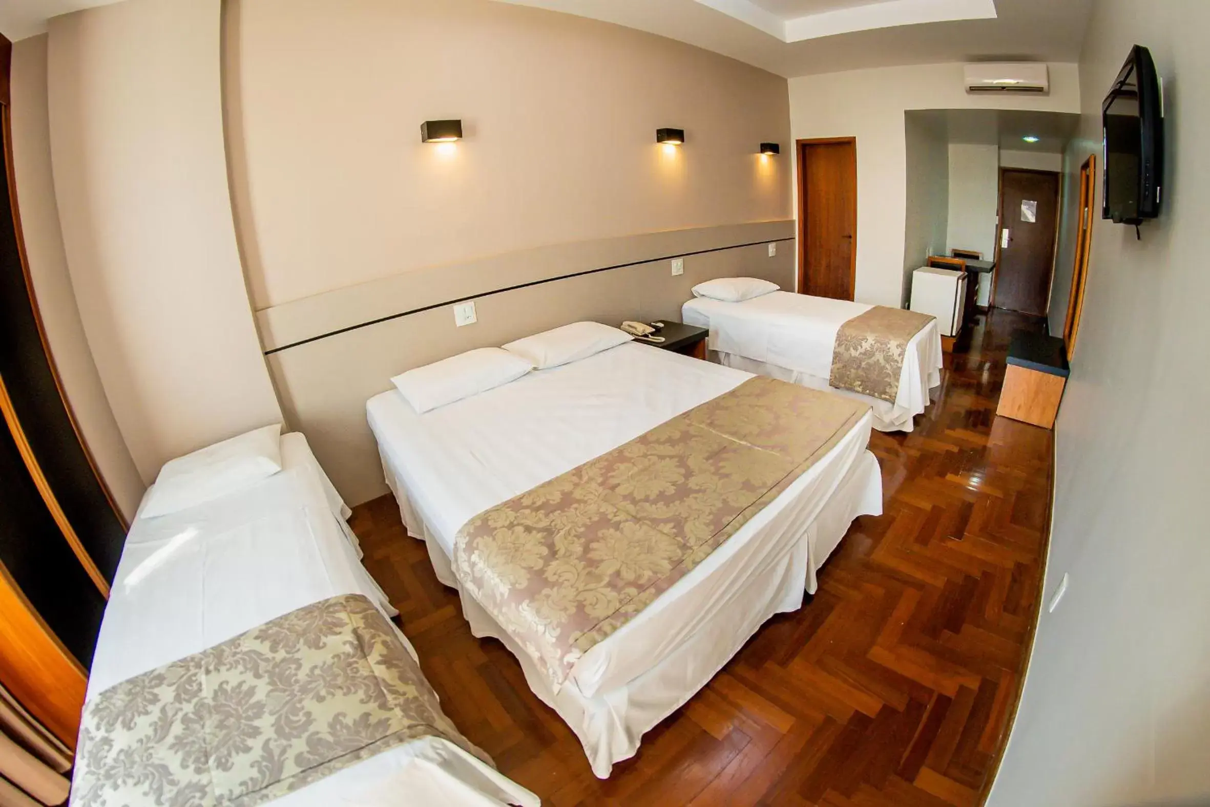 Bed in Serrano Residencial Hotel