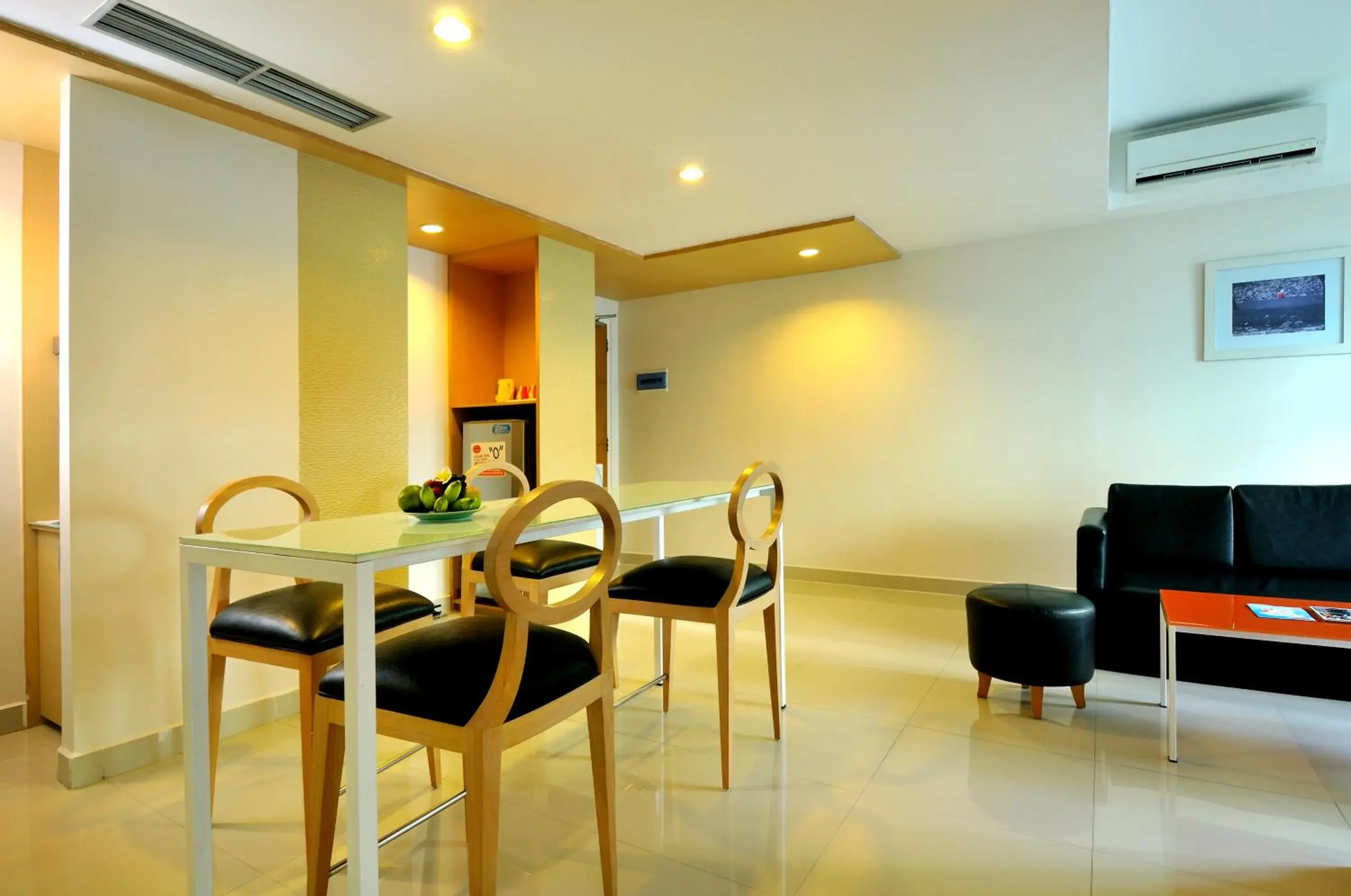 Living room, Dining Area in HOTEL and RESIDENCES Riverview Kuta - Bali (Associated HARRIS)