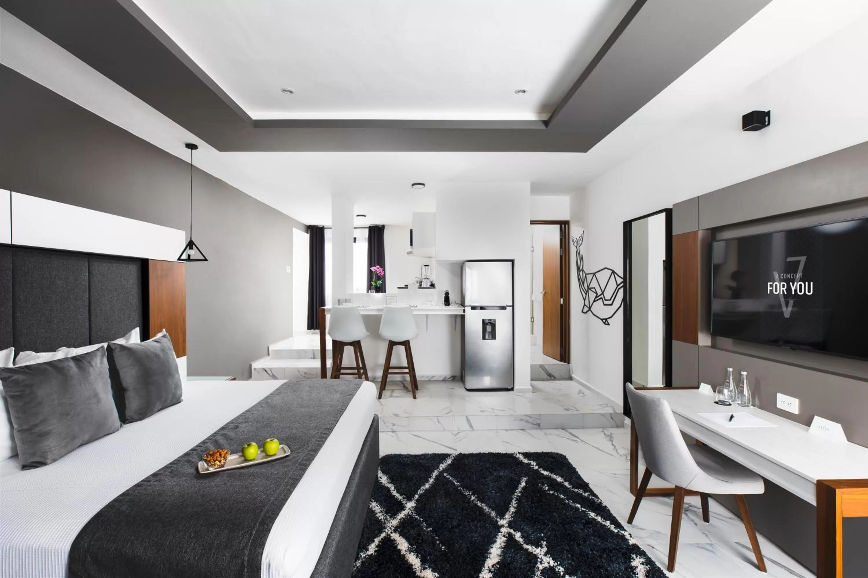 Communal lounge/ TV room in Seven Boutique Apartments Cancún