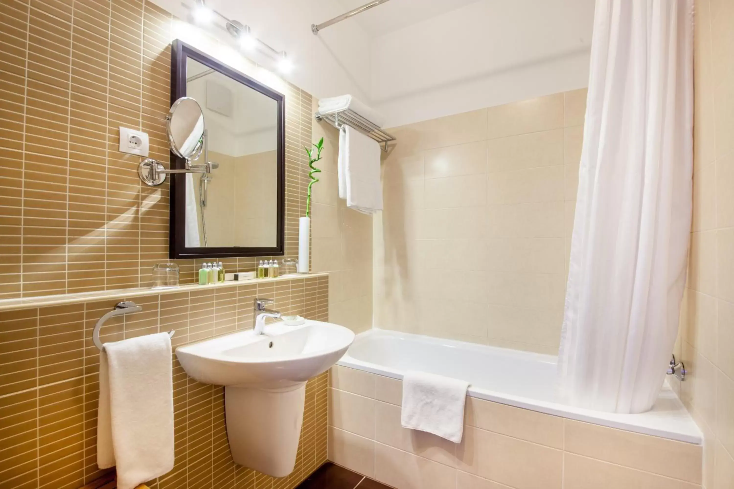 Bathroom in Escala Hotel & Suites