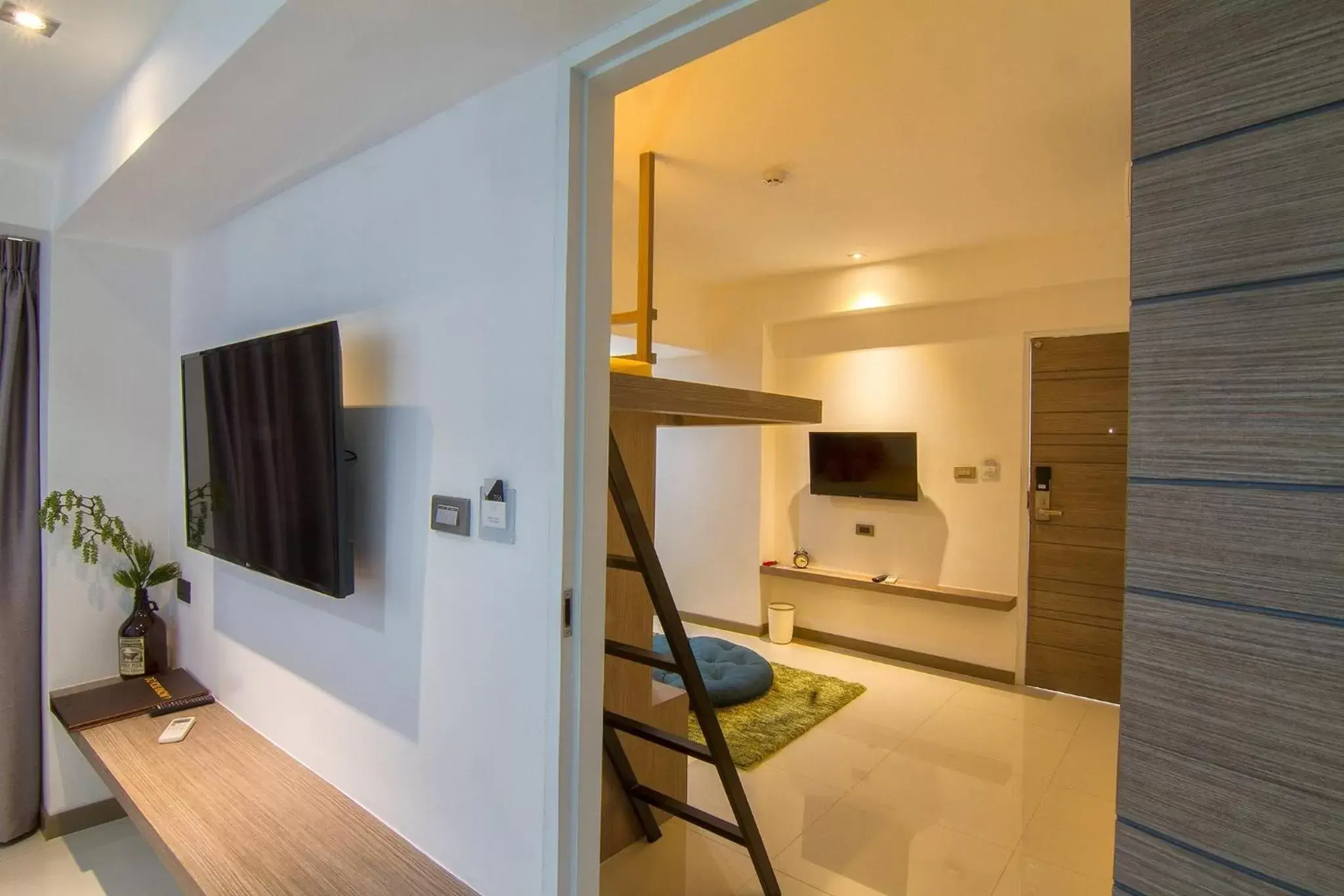 TV/Entertainment Center in Bossotel Chiang Mai - SHA Plus