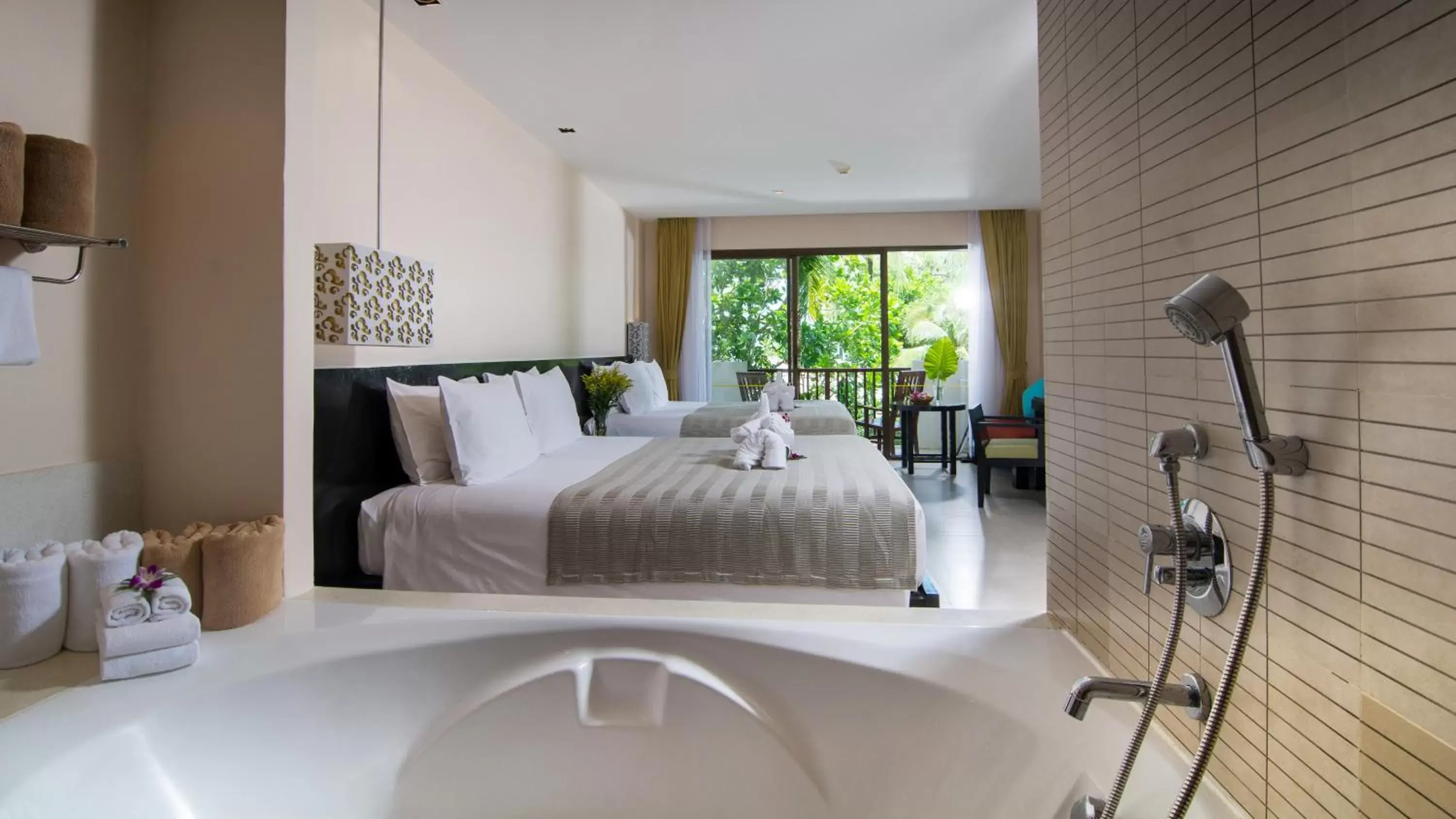 Bed in Apsara Beachfront Resort & Villa - SHA Extra Plus Bed in Apsara Beachfront Resort & Villa - SHA Extra Plus