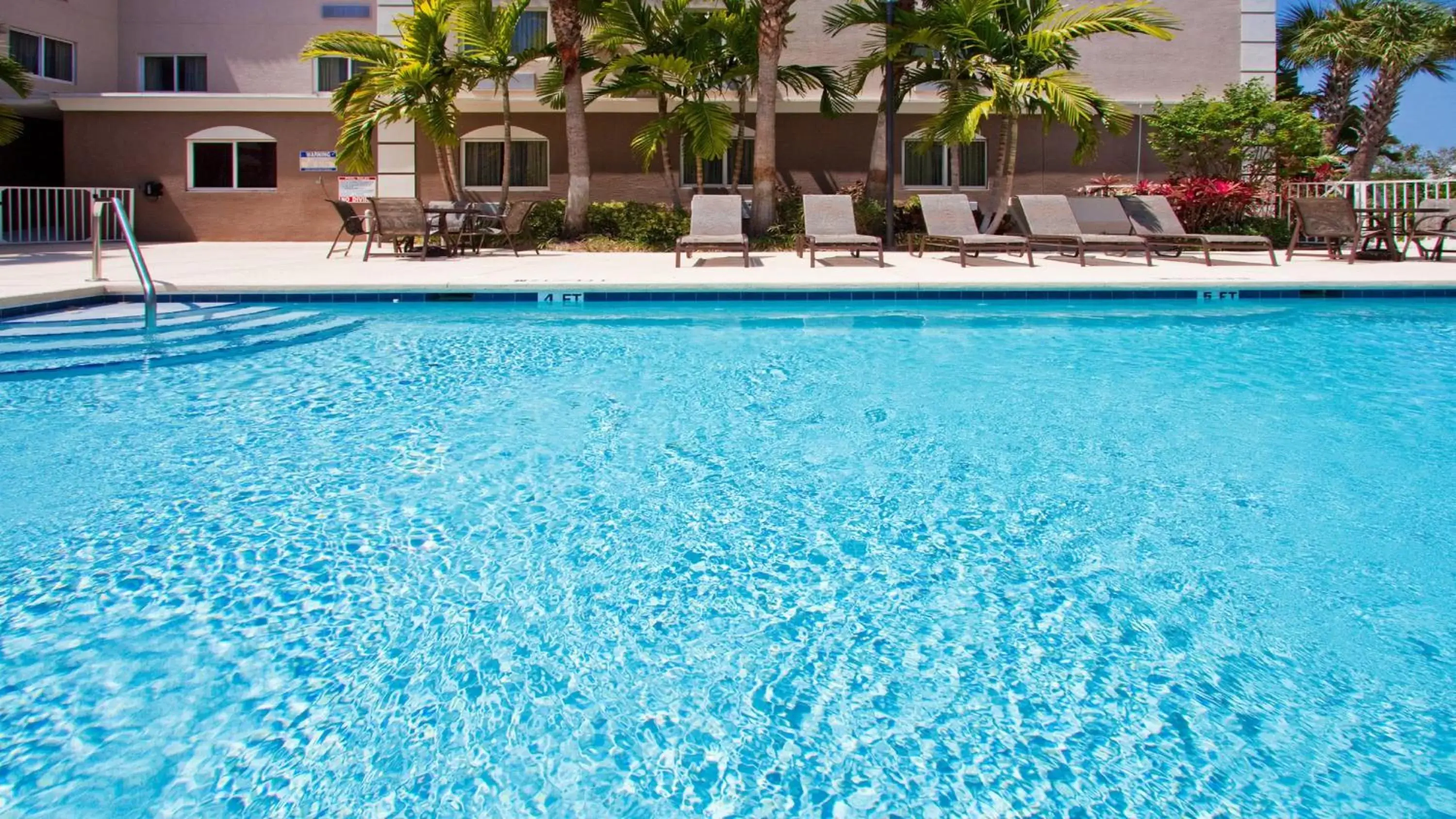 Swimming Pool in Holiday Inn Express West Palm Beach Metrocentre, an IHG Hotel