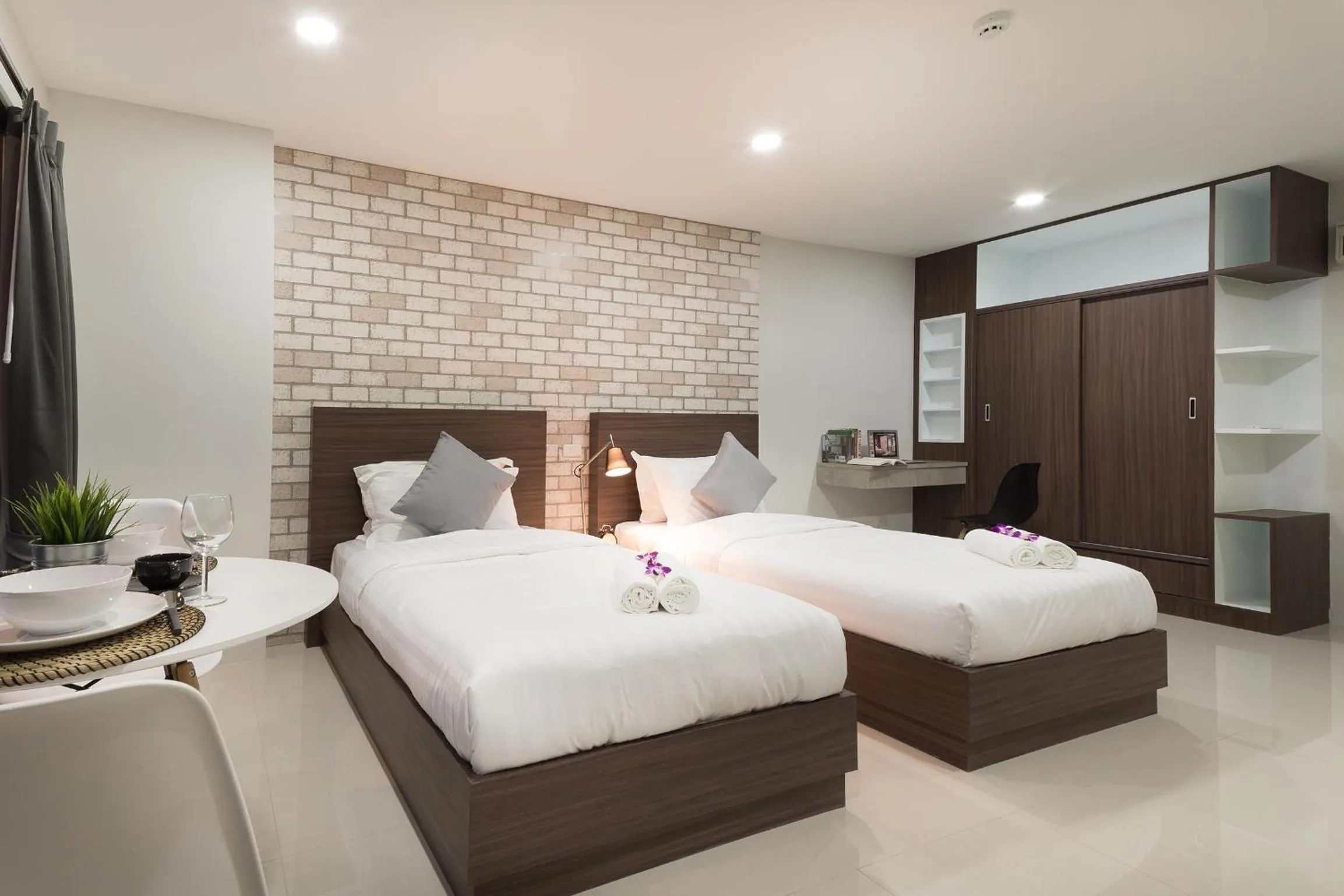 Bed in Q Space Residence