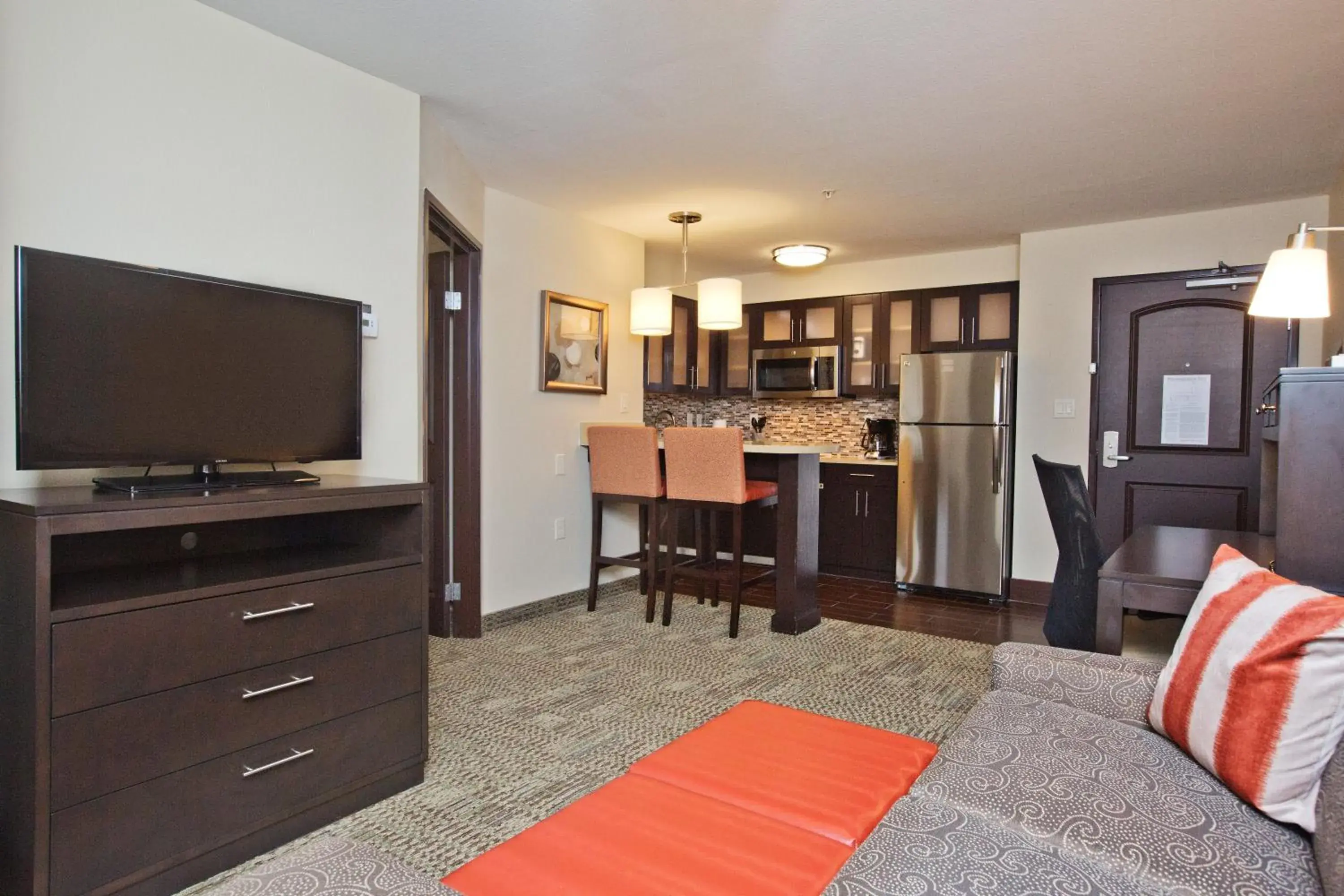 Photo of the whole room, TV/Entertainment Center in Staybridge Suites Austin South Interstate Hwy 35, an IHG Hotel
