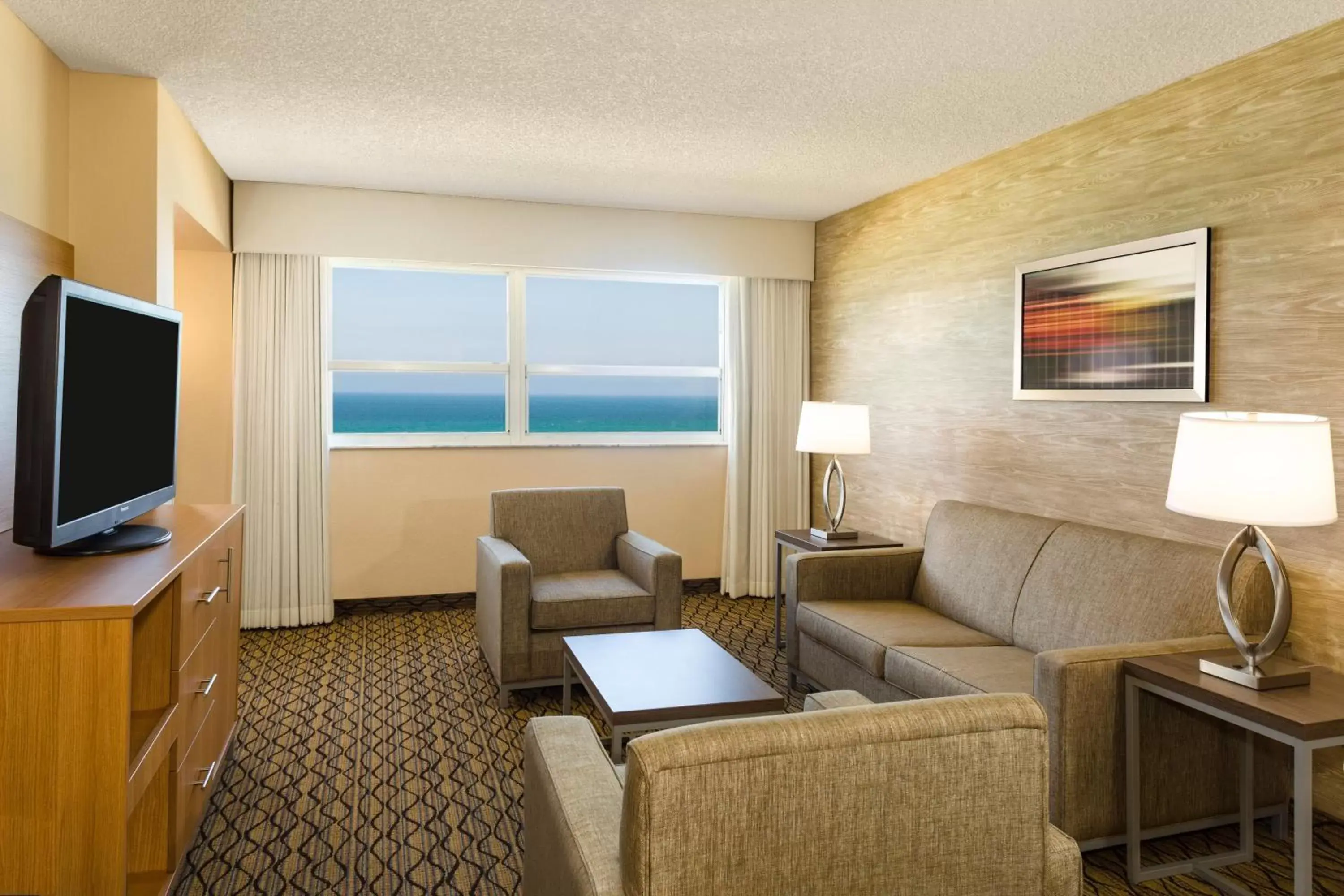 Bedroom, Seating Area in Holiday Inn Miami Beach-Oceanfront, an IHG Hotel