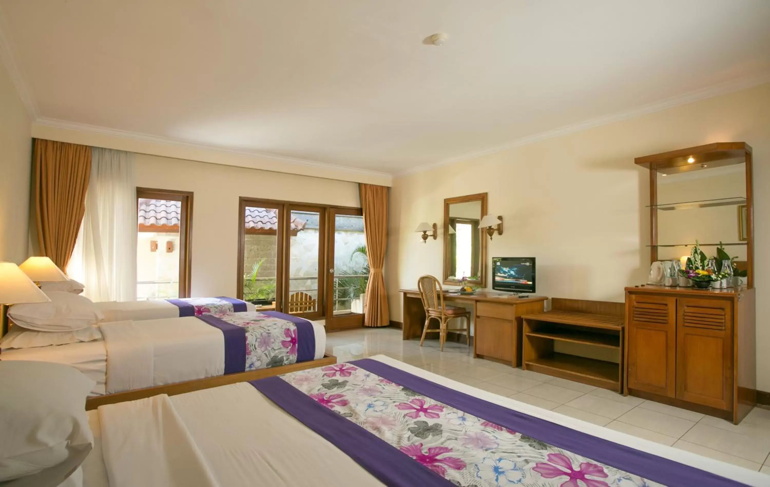 Bed in Parigata Resorts and Spa