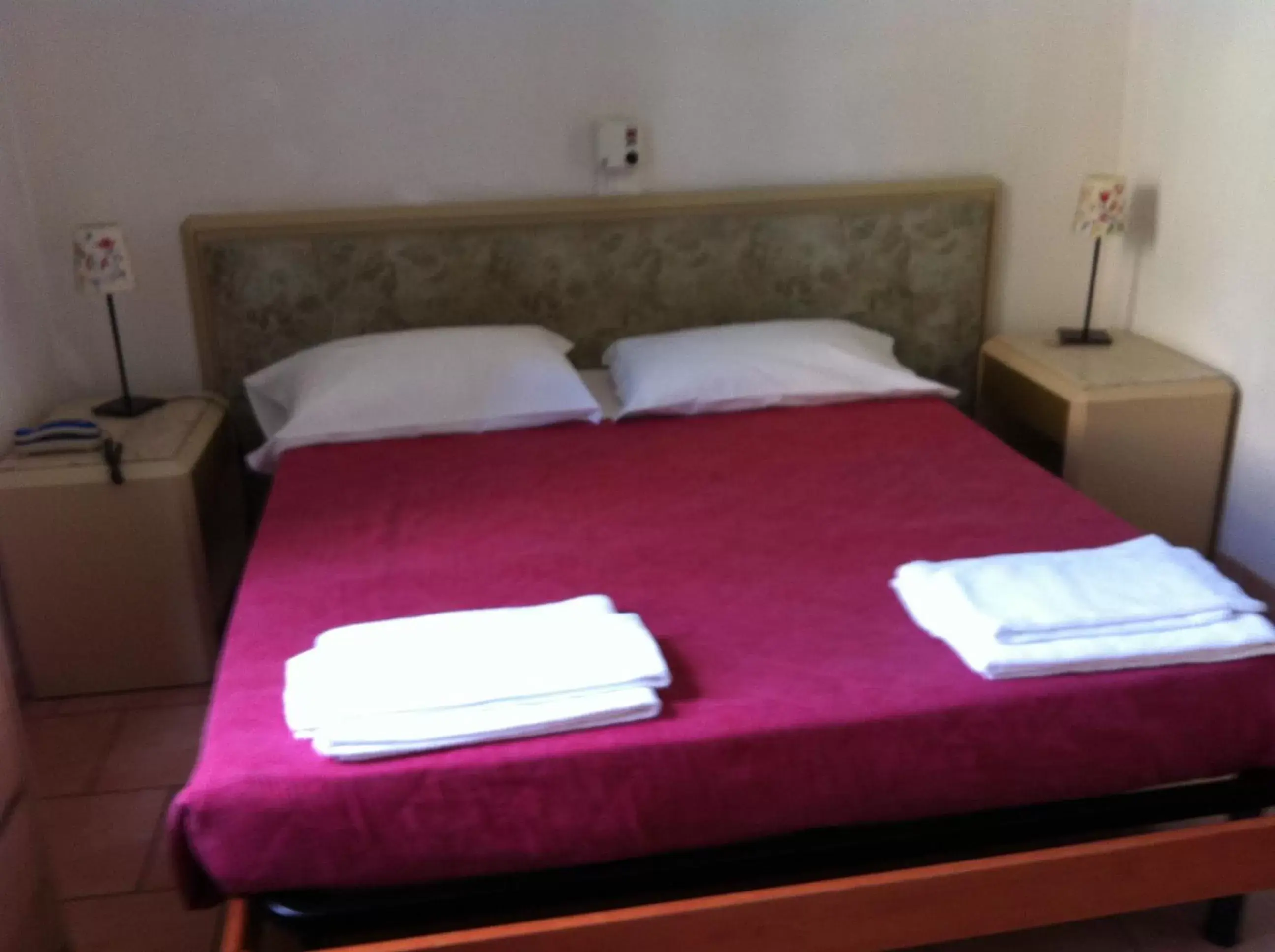 Bed in Hotel Gambara