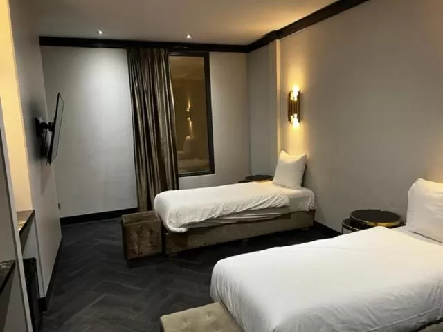 Bedroom, Bed in Triple G Hotels