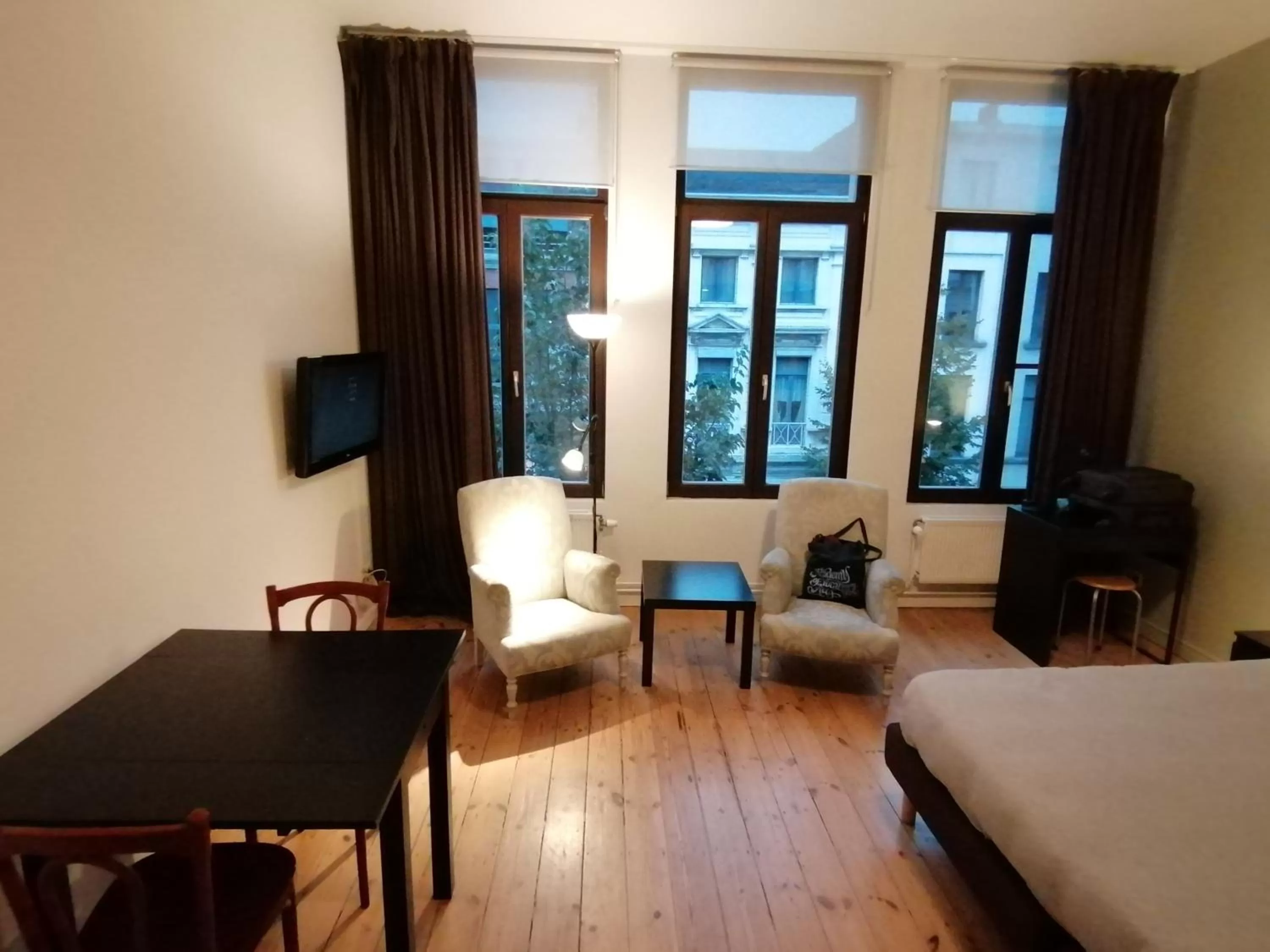 Seating area, Bed in Because the Night city lodge