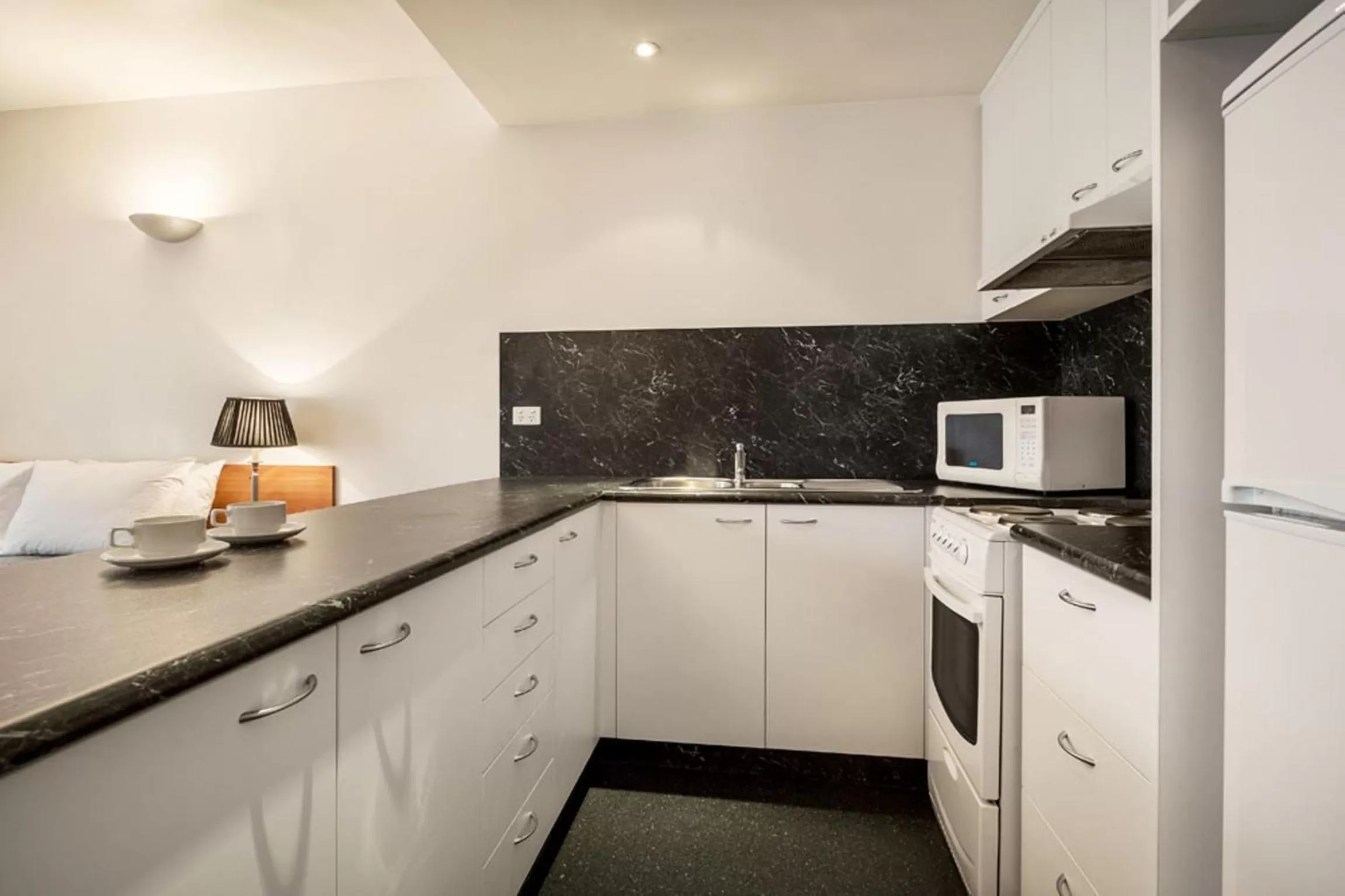 Kitchen or kitchenette in Quest Savoy