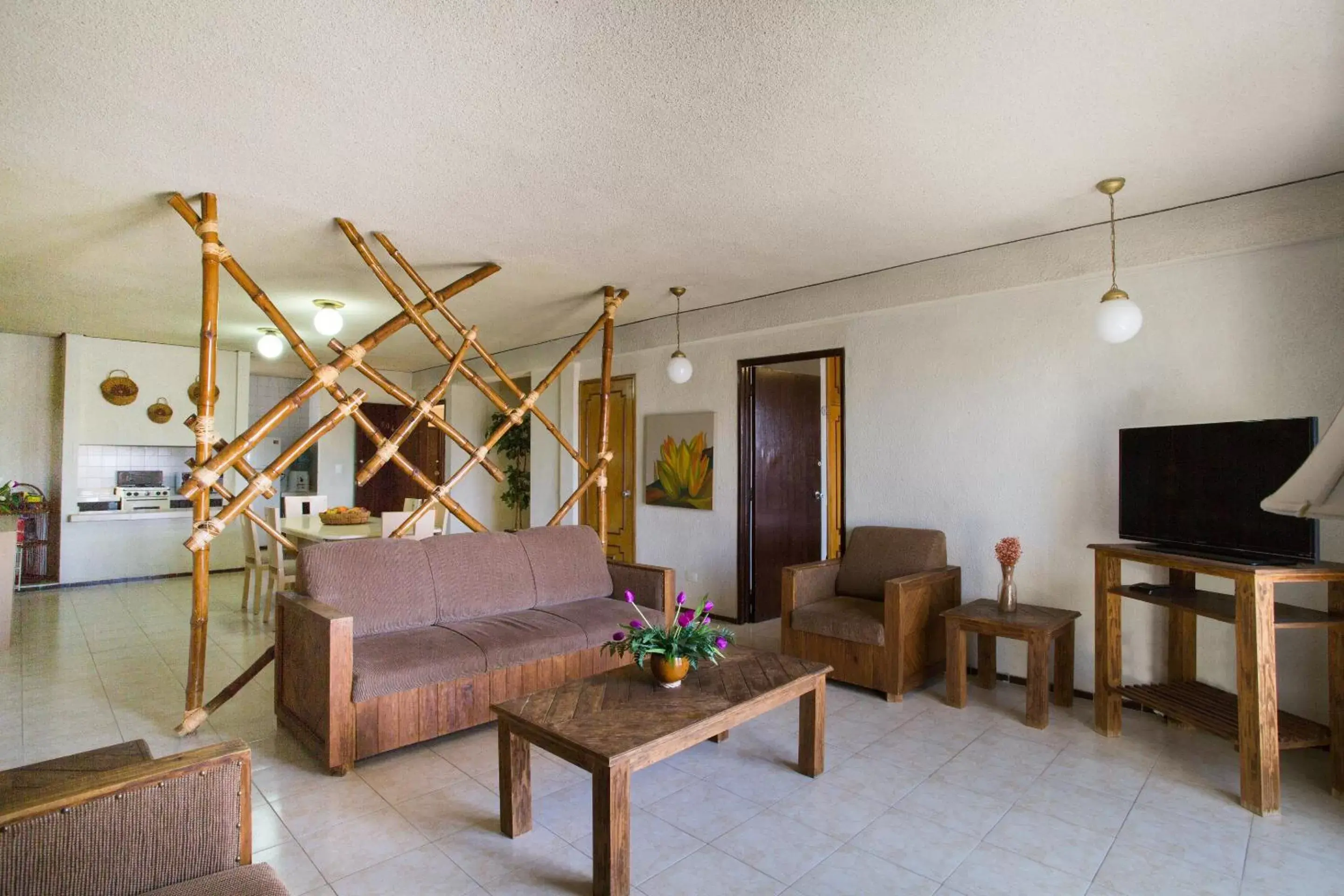 Bedroom, Seating Area in Suites Del Sol