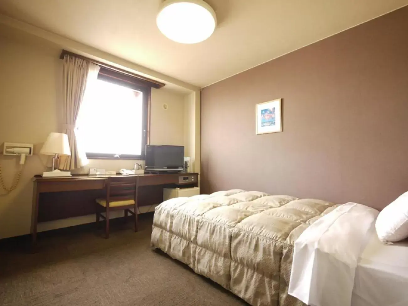 Bed in Hotel Route-Inn Shinonoi