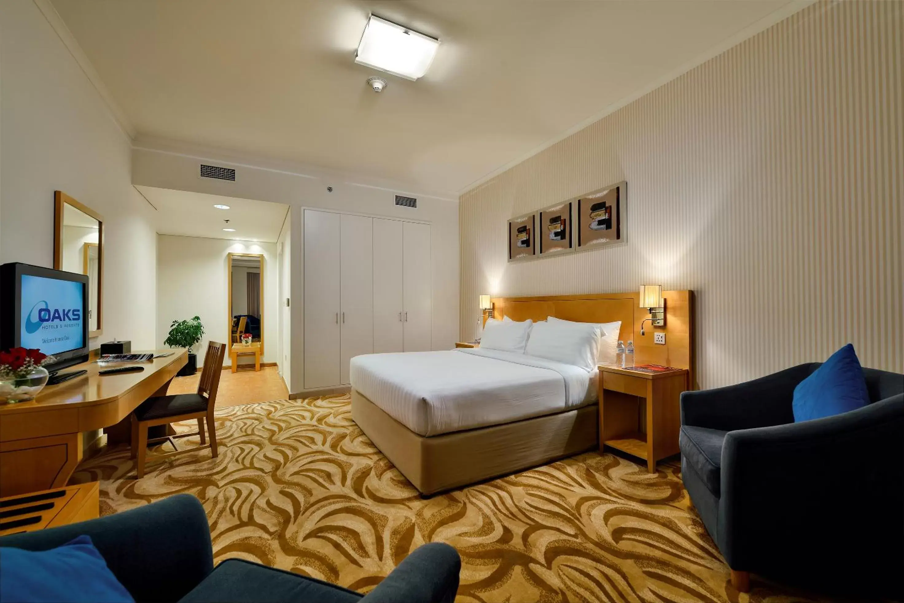 Bedroom in Oaks Liwa Heights Hotel Suites