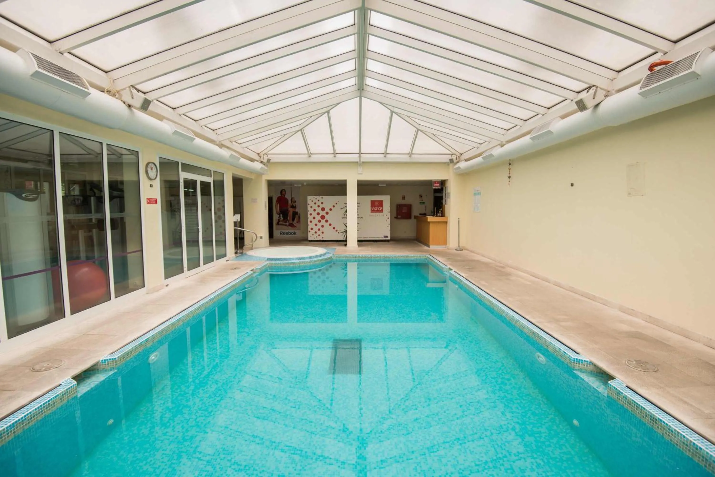 Swimming pool in Azoris Angra Garden – Plaza Hotel