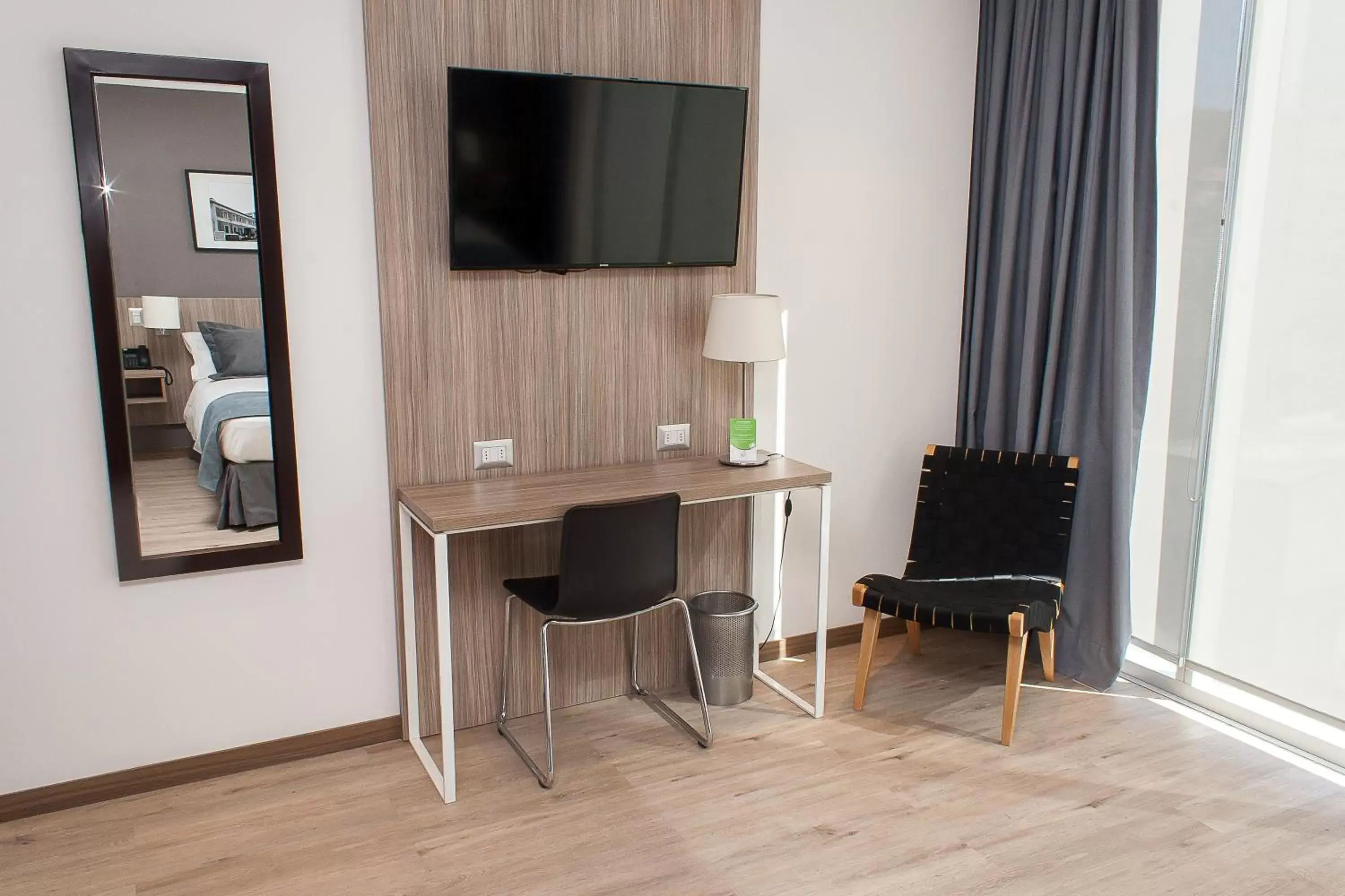 Seating area, TV/Entertainment Center in Hotel Capital Bellet