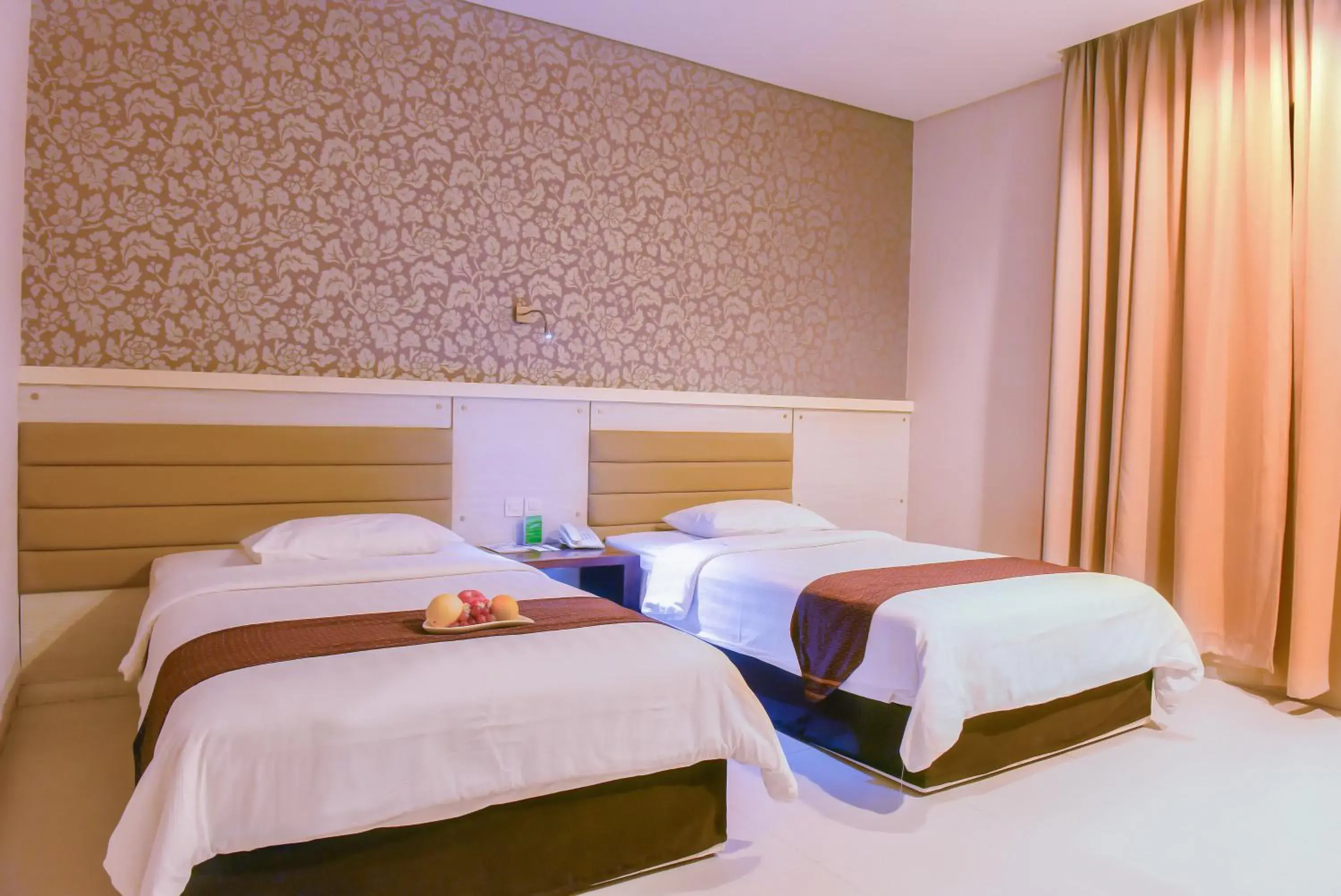 Bed in Sahid T-More Hotel