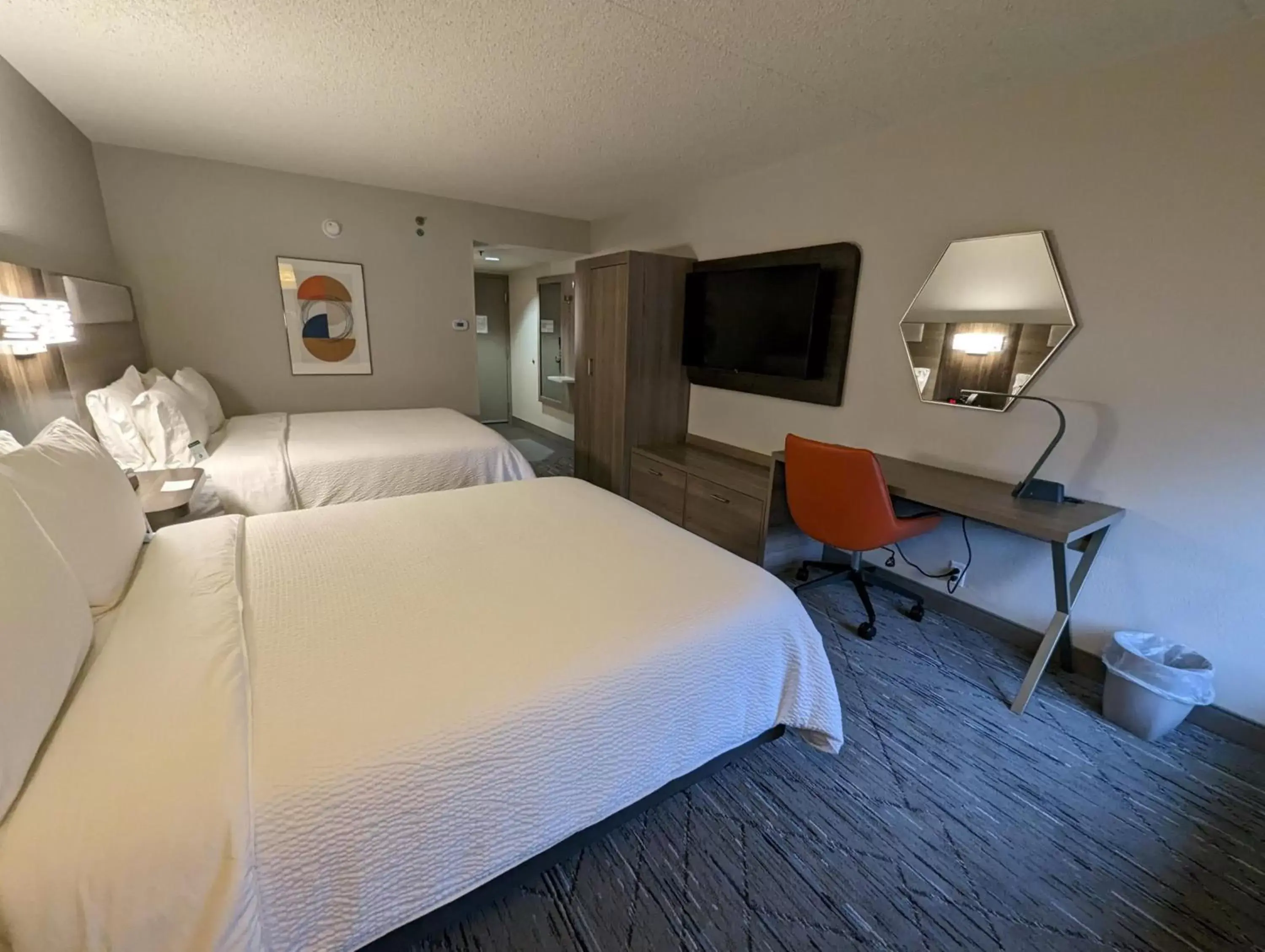 Photo of the whole room, TV/Entertainment Center in Holiday Inn Express Indianapolis Airport, an IHG Hotel