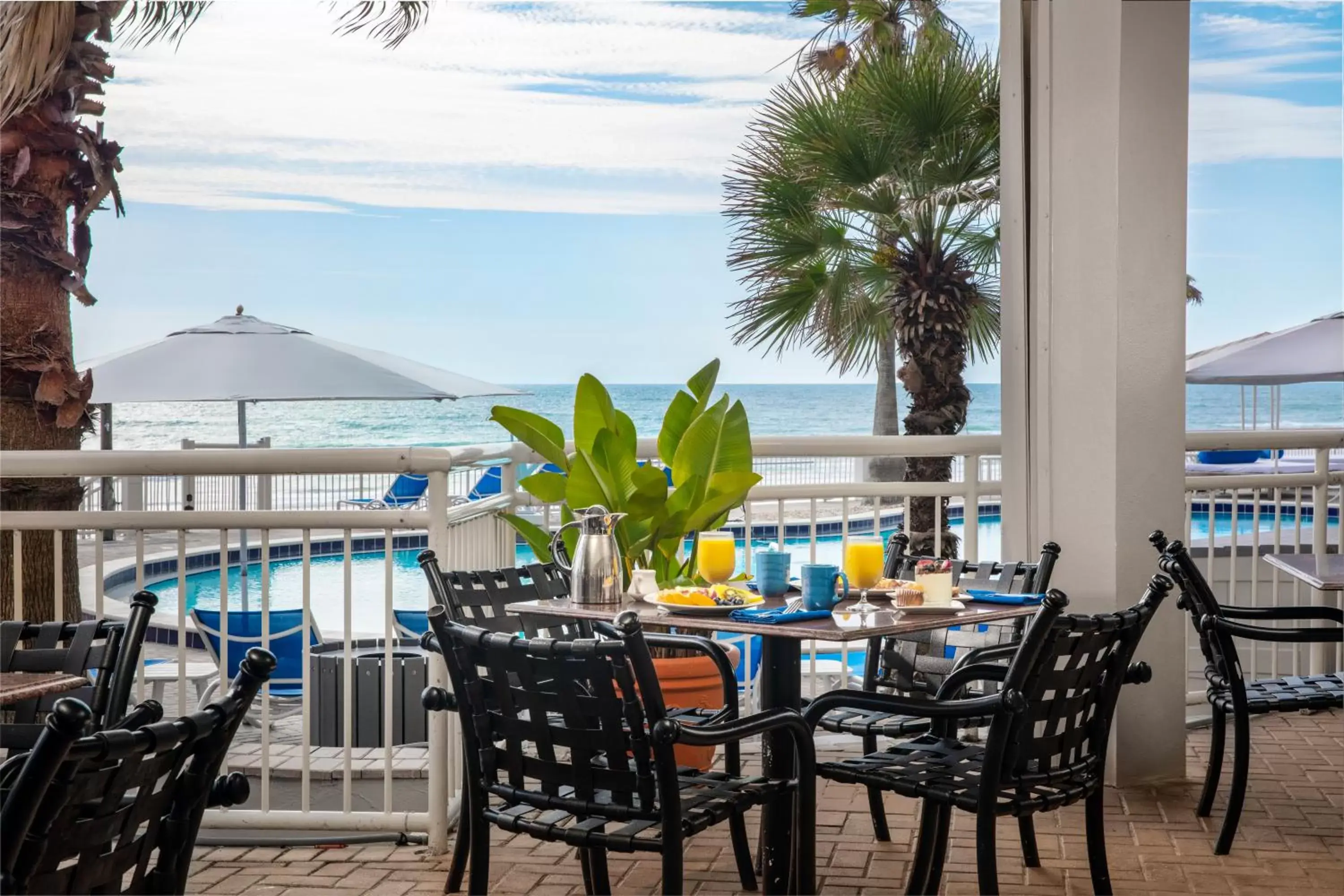 Patio, Pool View in The Shores Resort & Spa