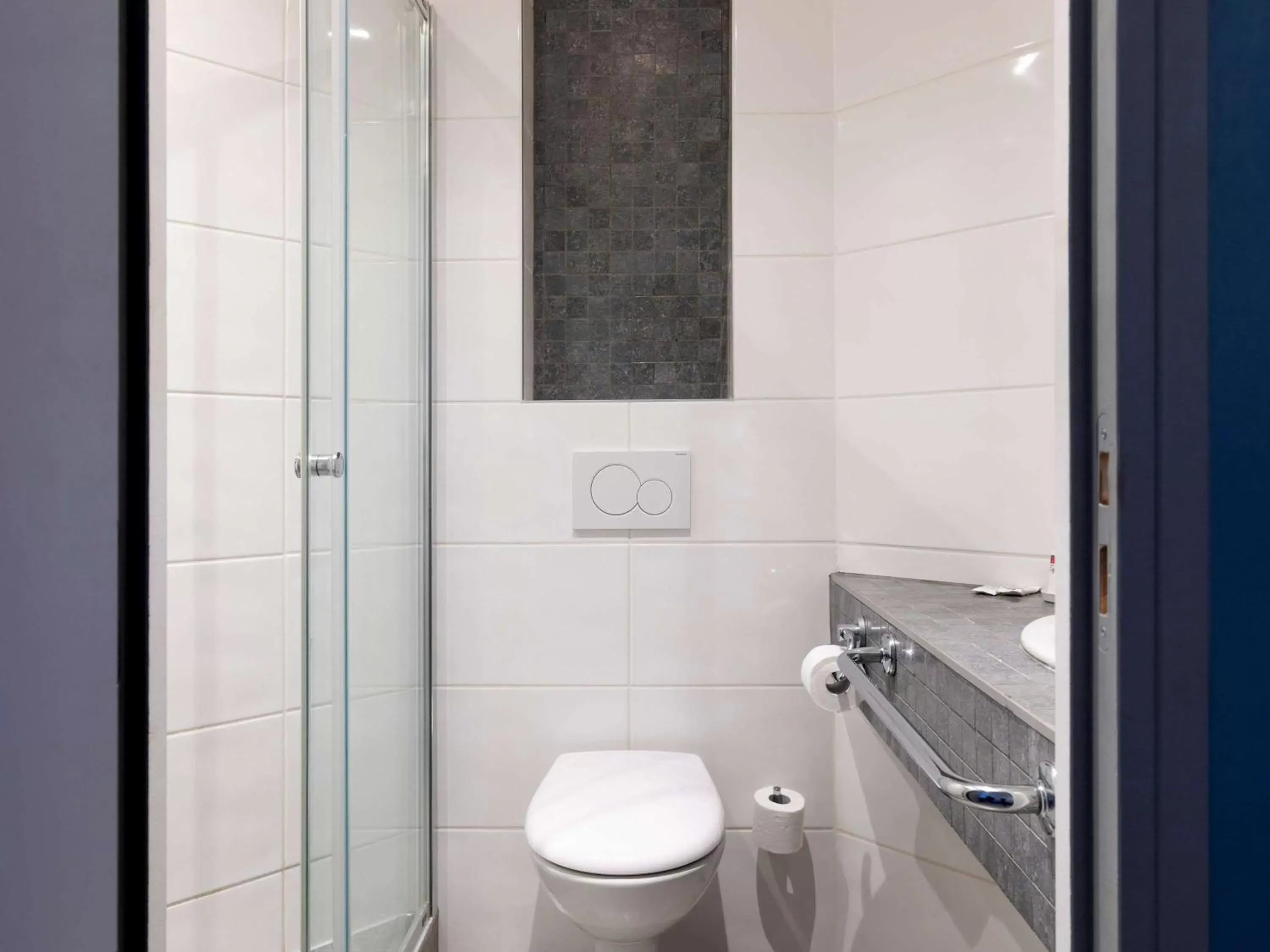 Bathroom in Ibis Budget Lyon Est Saint Quentin Fallavier
