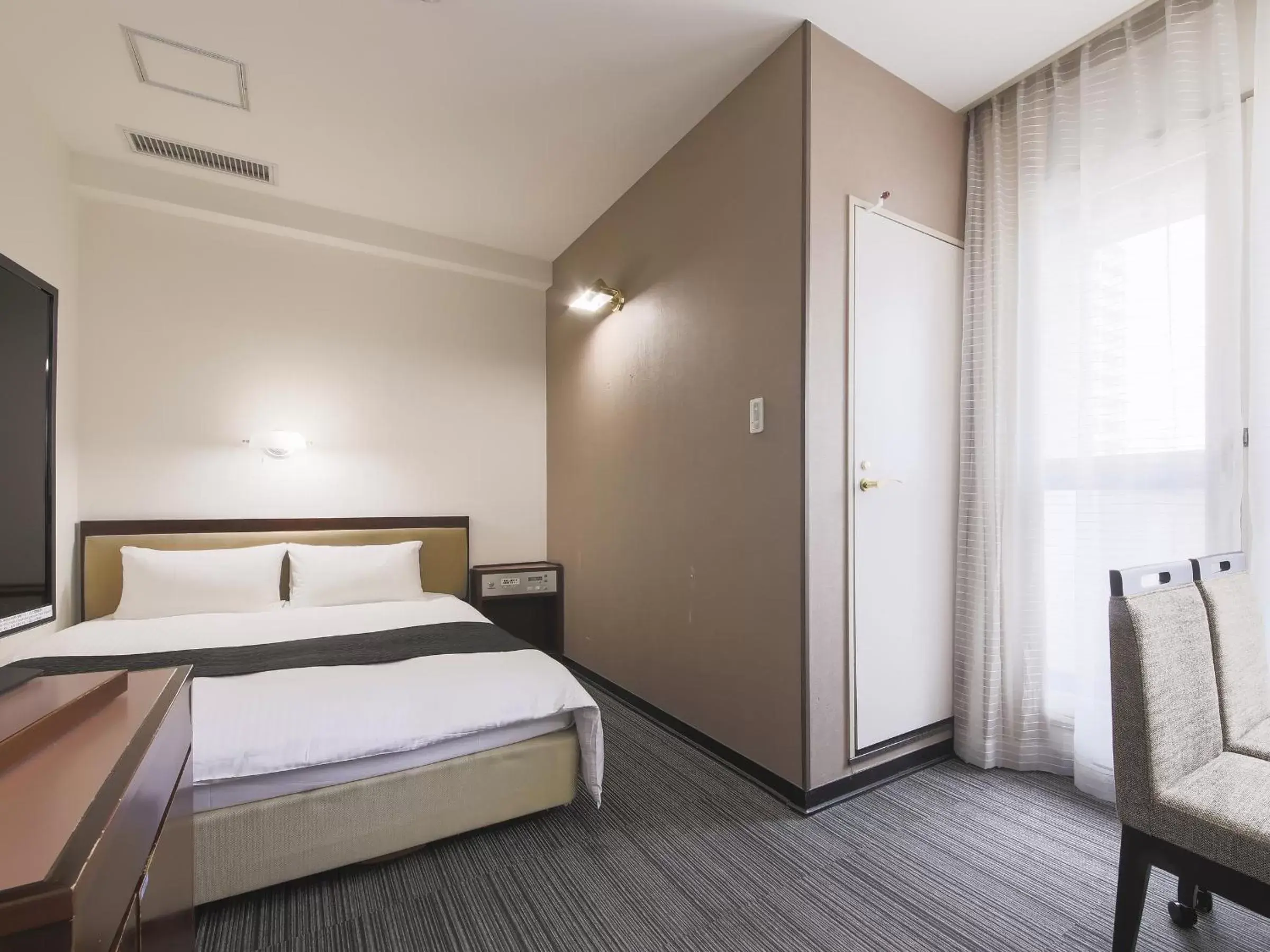 Photo of the whole room, Bed in APA Hotel Yamagata Ekimae Odori