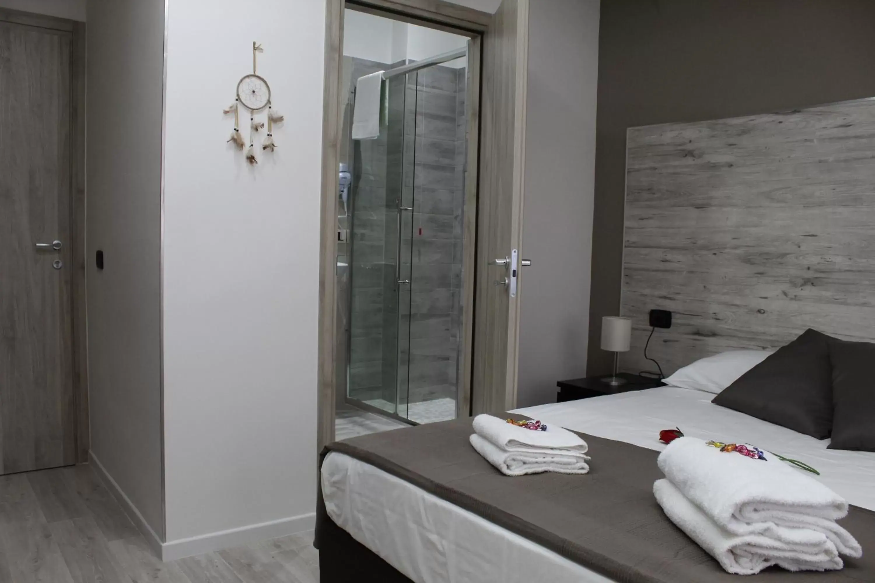 Shower, Bed in Royalty Rooms & Spa