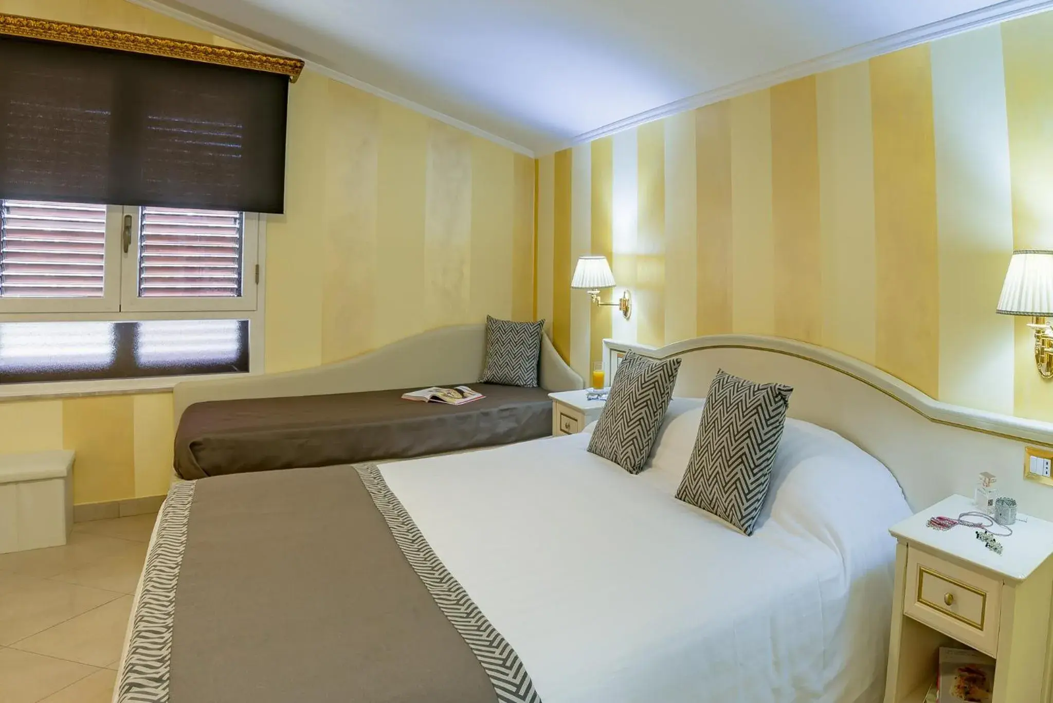 Bed in Vittorio Emanuele Boutique Hotel