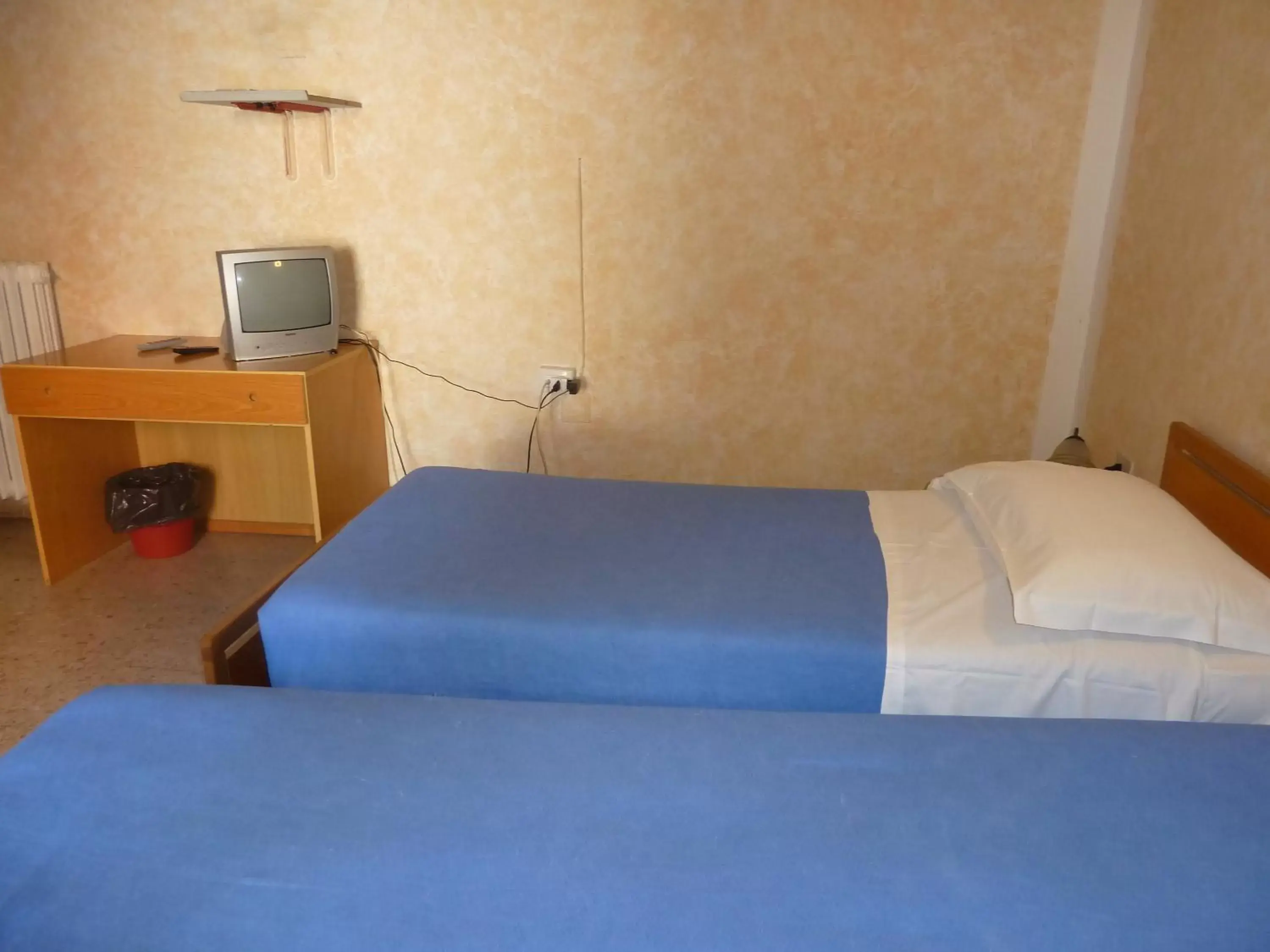 Bed in Hotel Bolognese