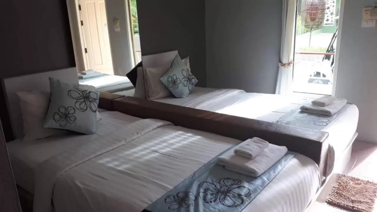 Bed in Panlaan Boutique Resort