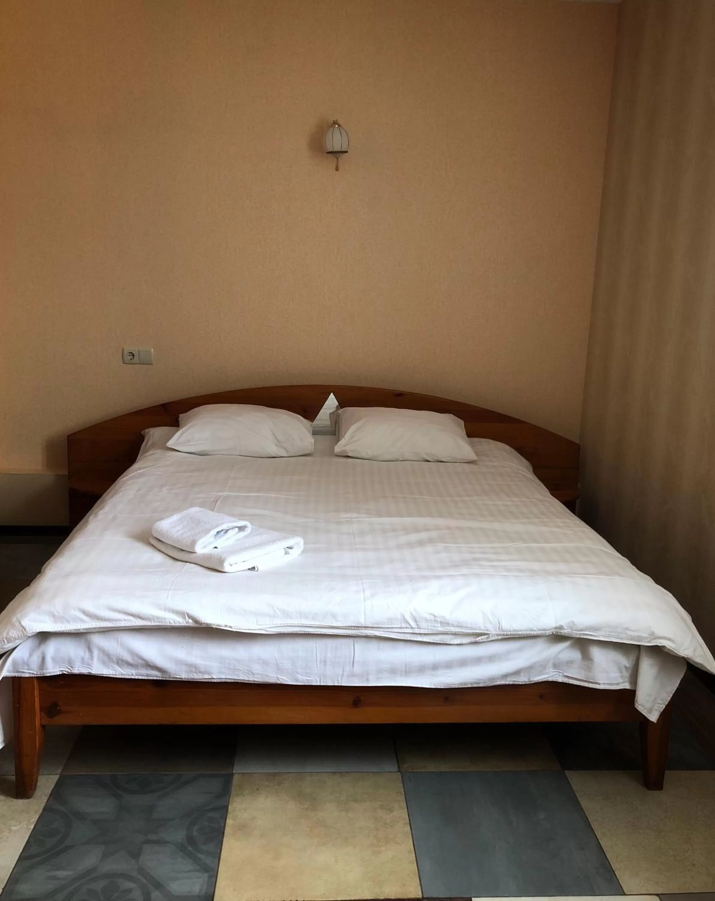 Bed in Zhuliany City Hotel