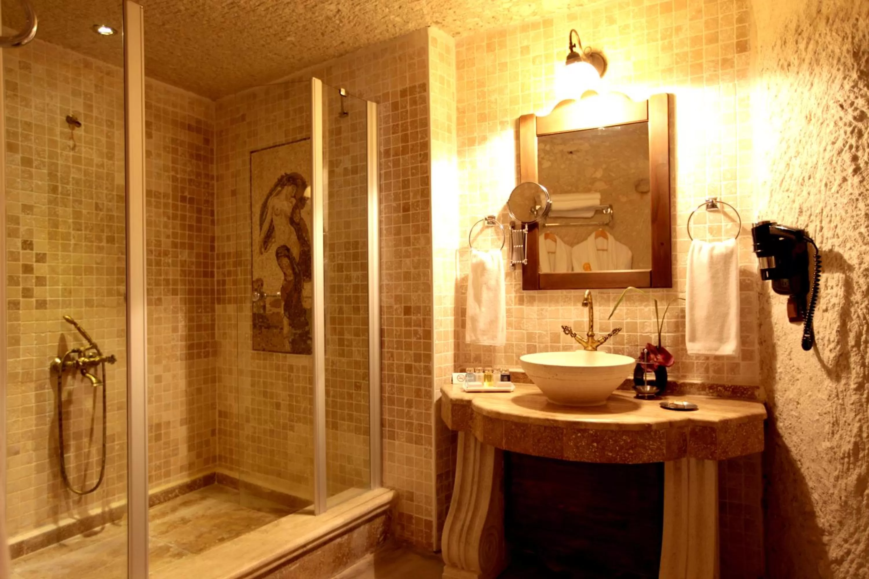 Bathroom in Miras Hotel