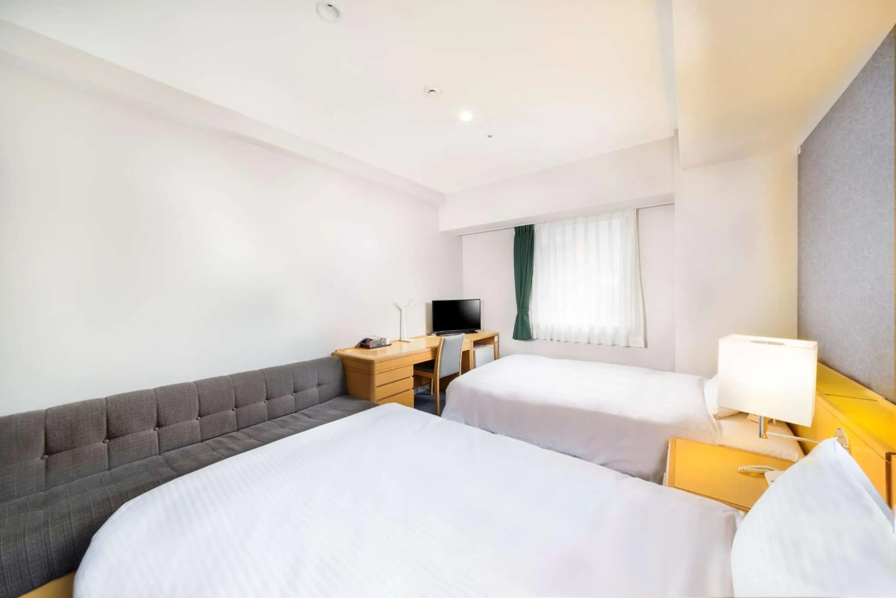 Bedroom, Bed in SureStay Plus Hotel by Best Western Shin-Osaka