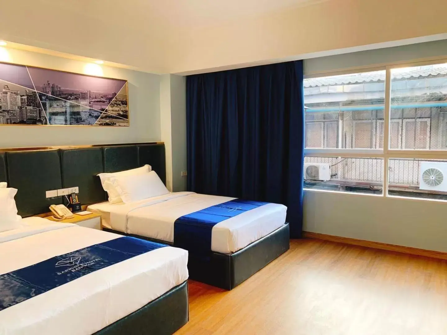 Photo of the whole room, Bed in Sapphire Hotel Silom Bangkok Photo of the whole room, Bed in Sapphire Hotel Silom Bangkok